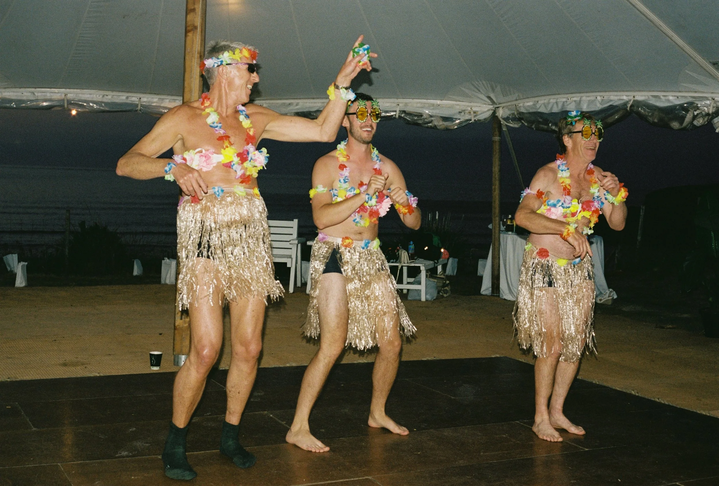 hula dancers at 90's themed wedding in cornwall