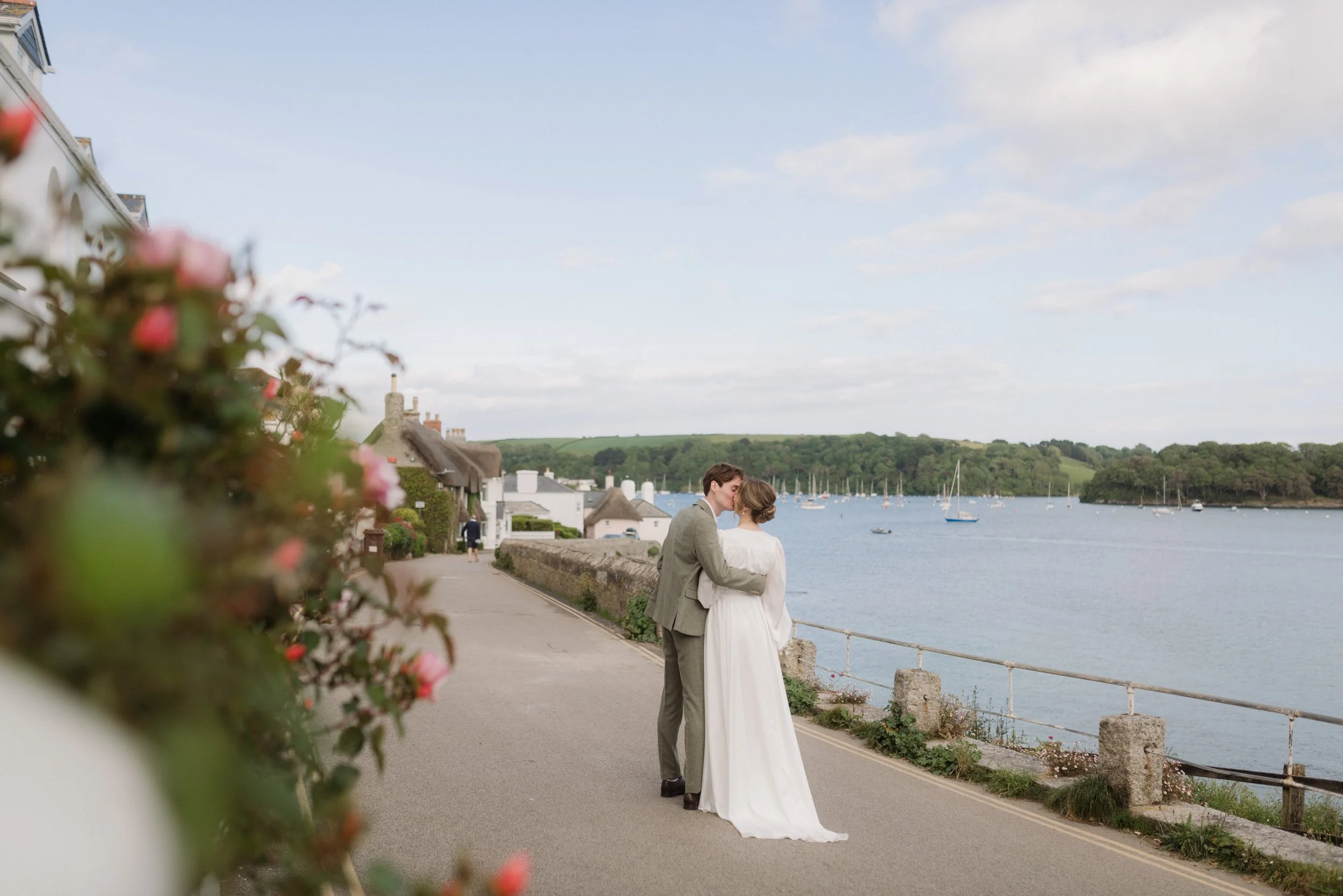 artful and relaxed editorial wedding photography of cornish elopement scenes with st mawes river in the background