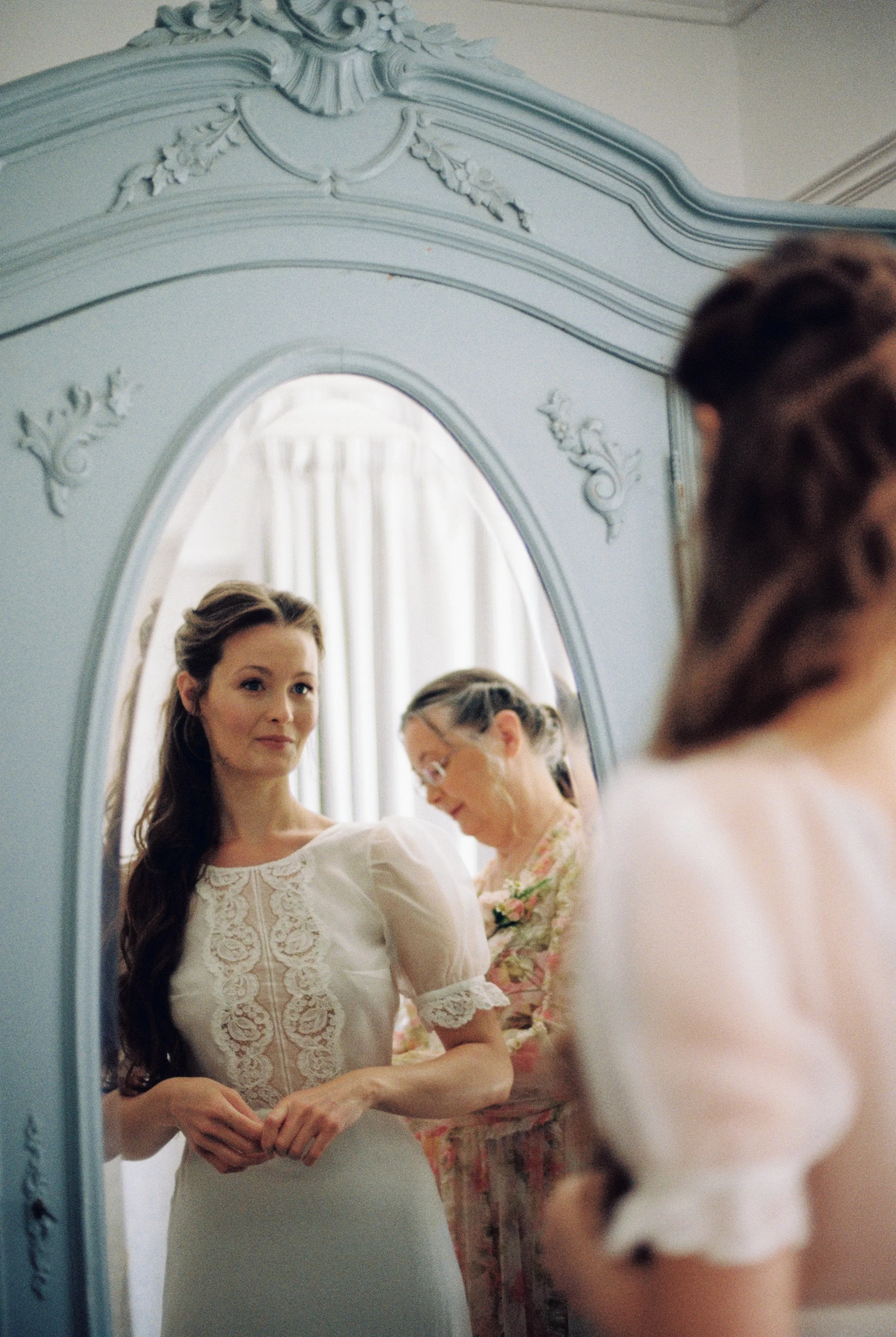 bridal preparations captured on film of a fairytale vintage wedding in cornwall with nostalgic analogue film photography and super 8