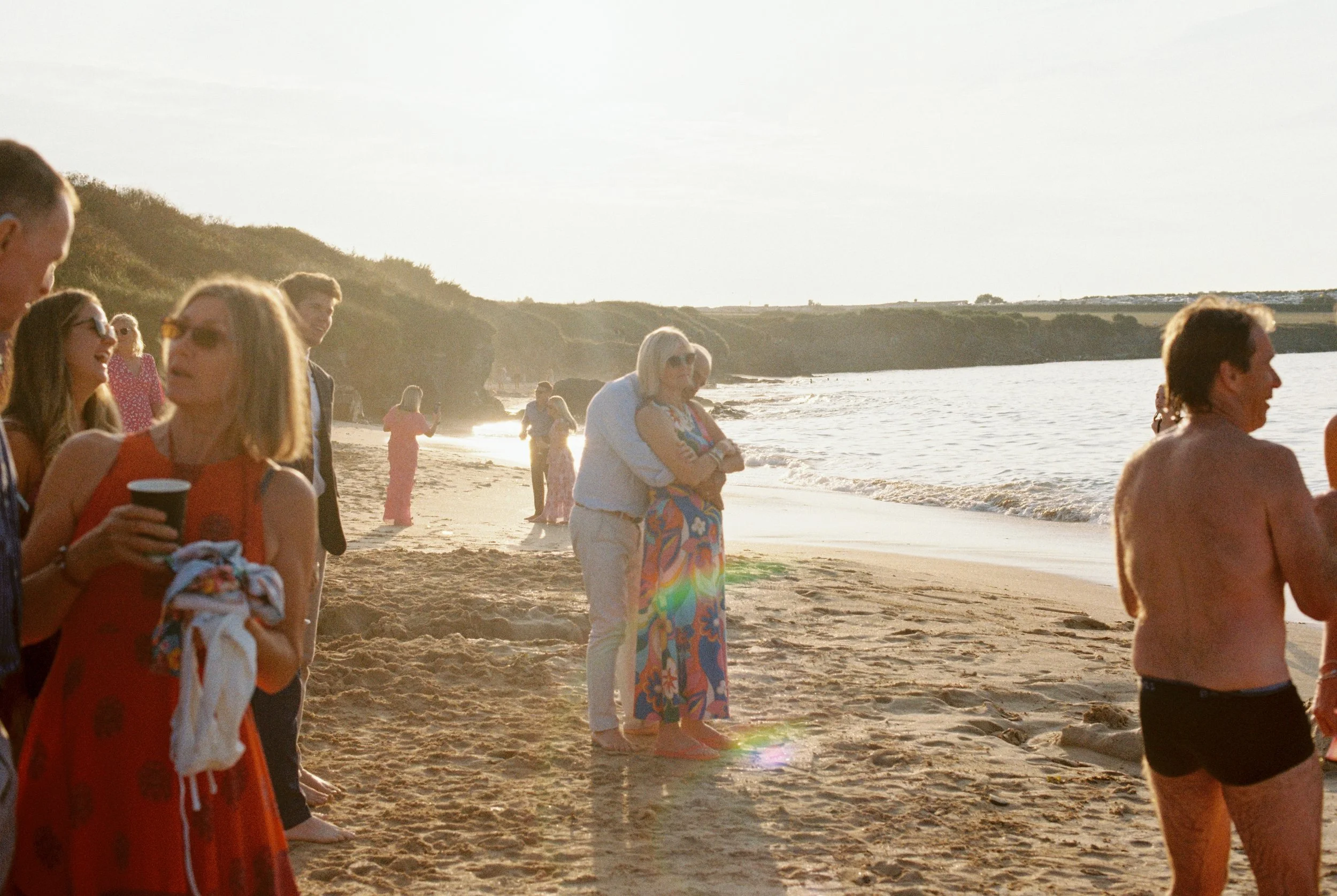 golden sunset light on the beach shot on kodak portra