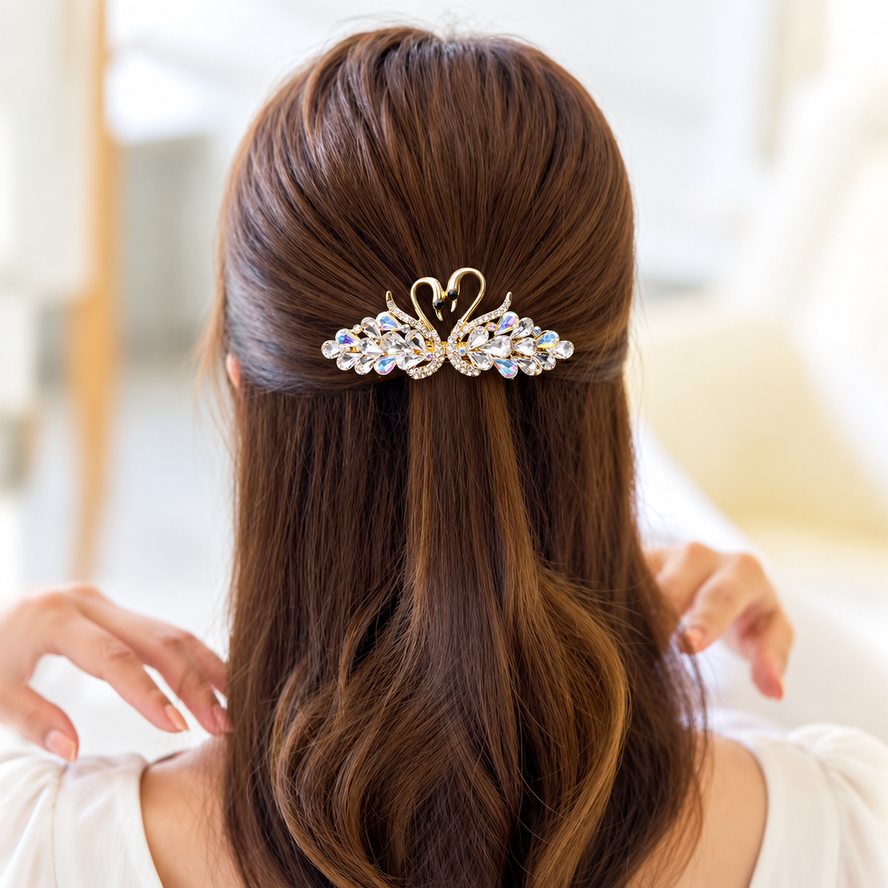 Crystal White Swan Barrette in Wavy Hair.png