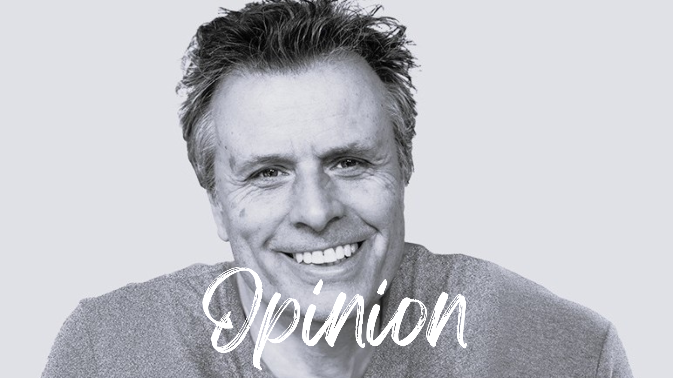 Black and white shot of Simon Wright with the word Opinion underneath in white script