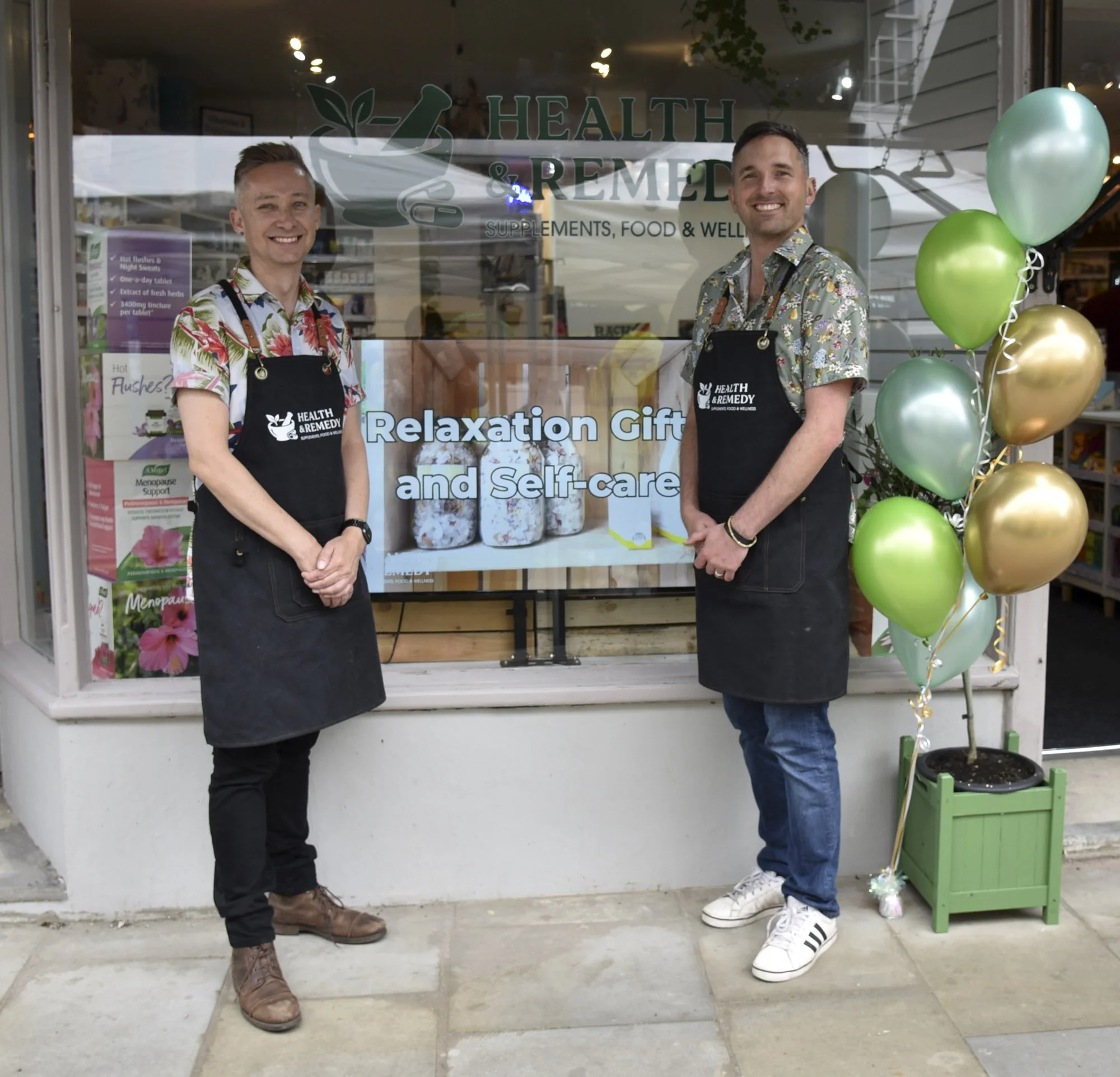 Jason and Cris Wootton outside Health & Remedy health food store.