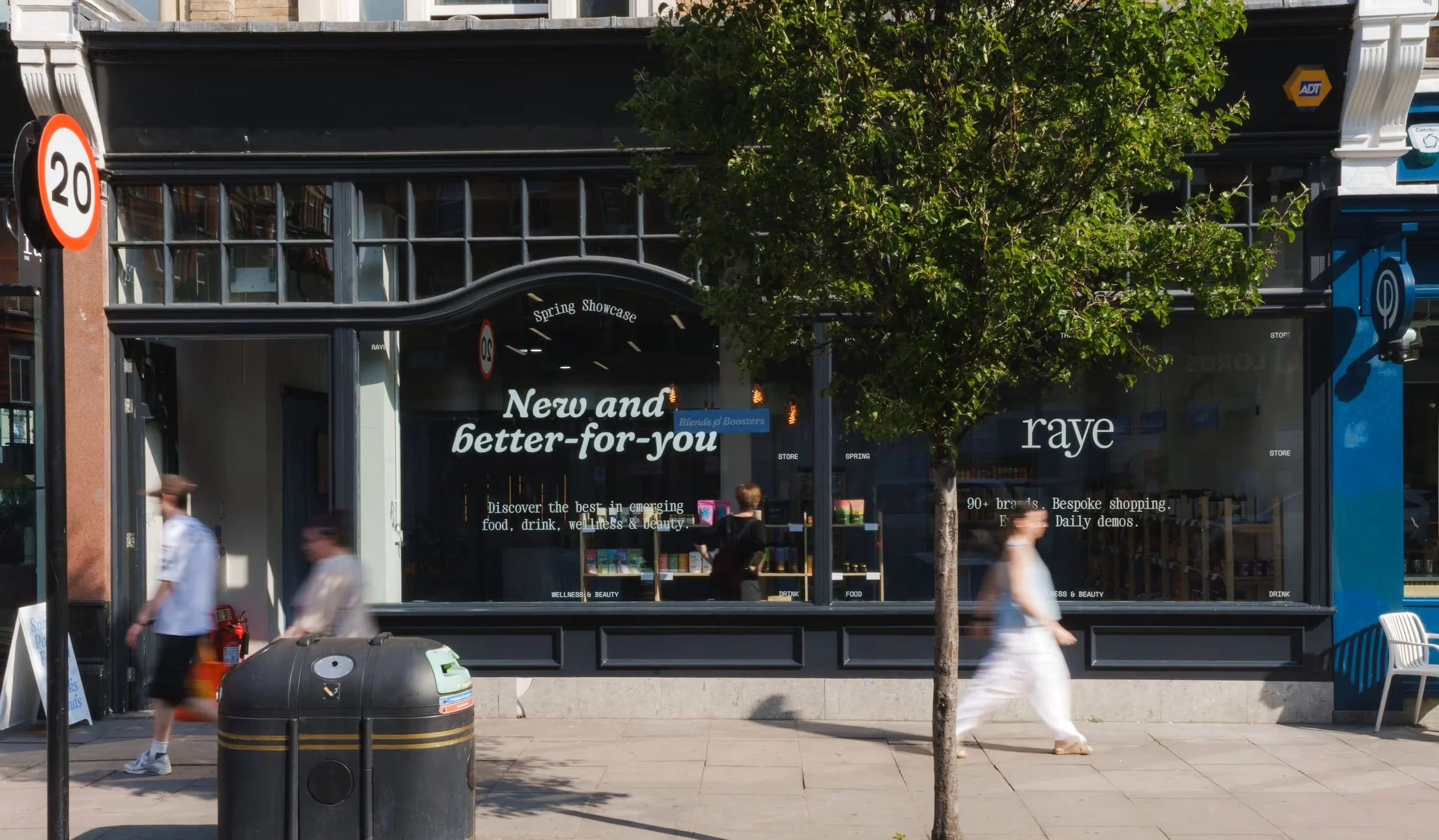 External view of raye the store's shop in Notting Hill with people walking past the big front windows.