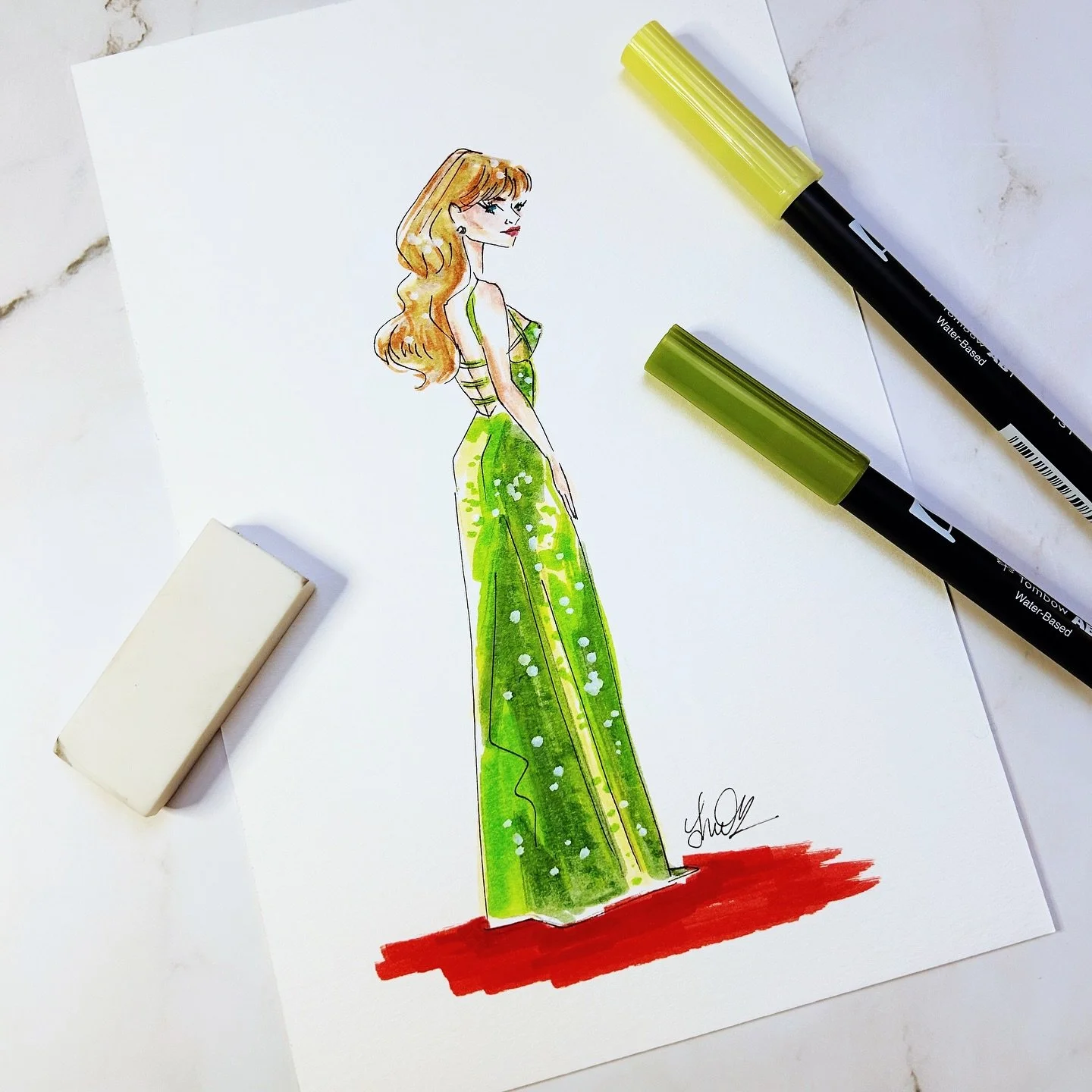 I am still thinking about this stunning, snaky gown @taylorswift wore to the 2025 Golden Globes. Who else is beyond curious to hear her new album??
.
.
.
.
.
#designedbyshea #taylorswift #fashionillustration #thelifeofashowgirl