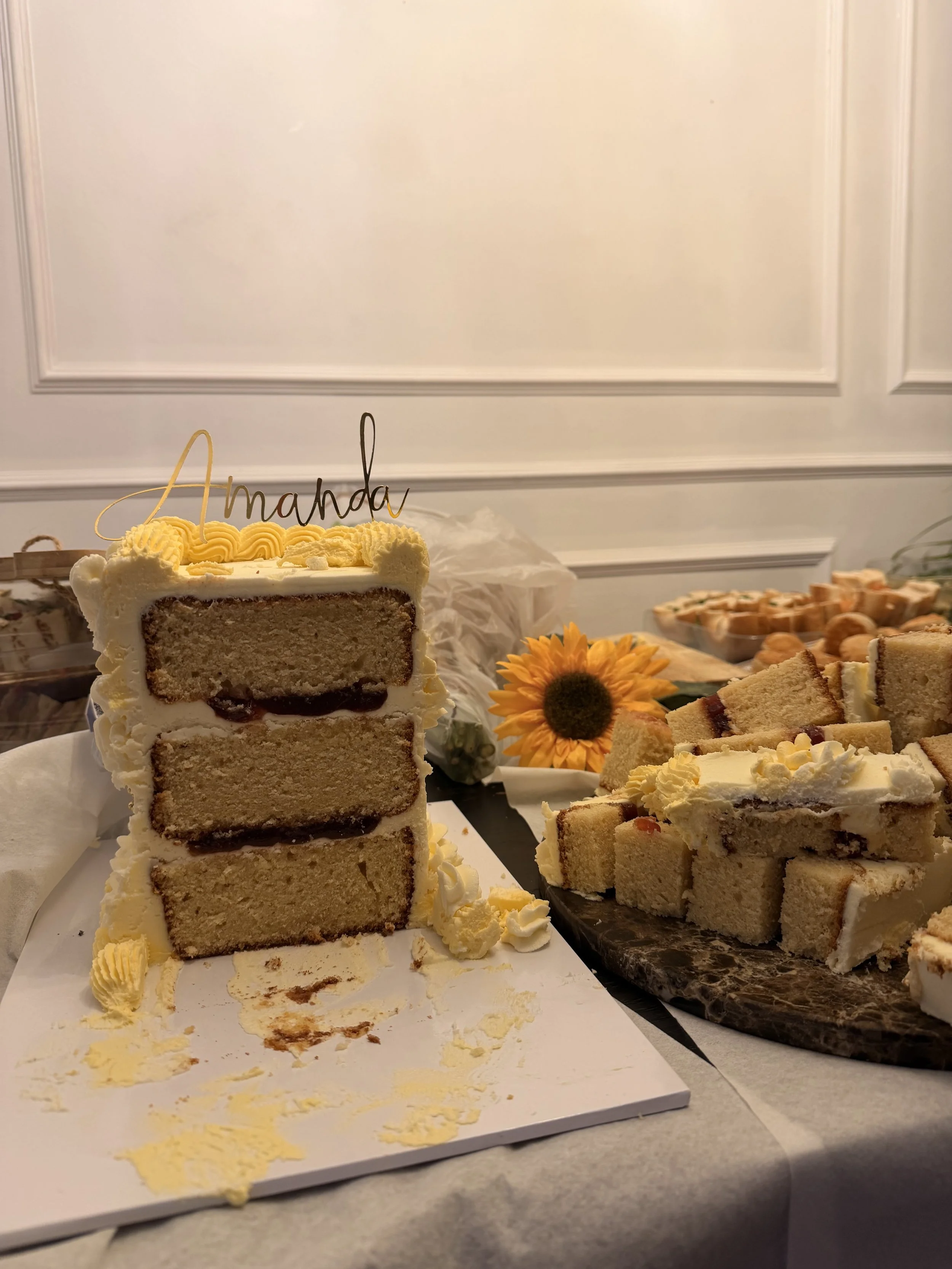 Inside a Merryfall Celebration Cake showing layers of sponge, filling and buttercream