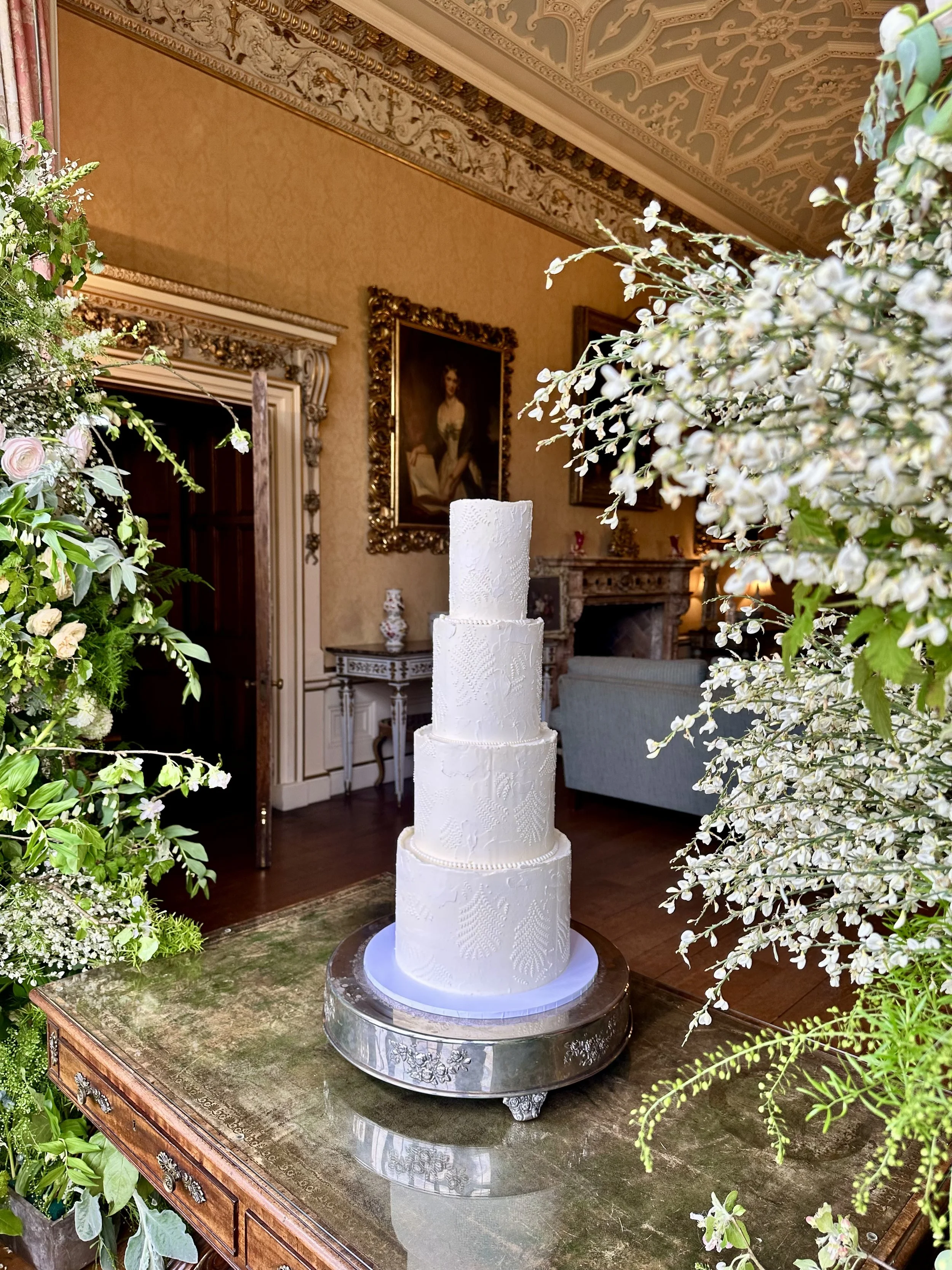 luxury tall tiered wedding cake at Arley Hall by Cheshire cake designer Merryfall Cakes