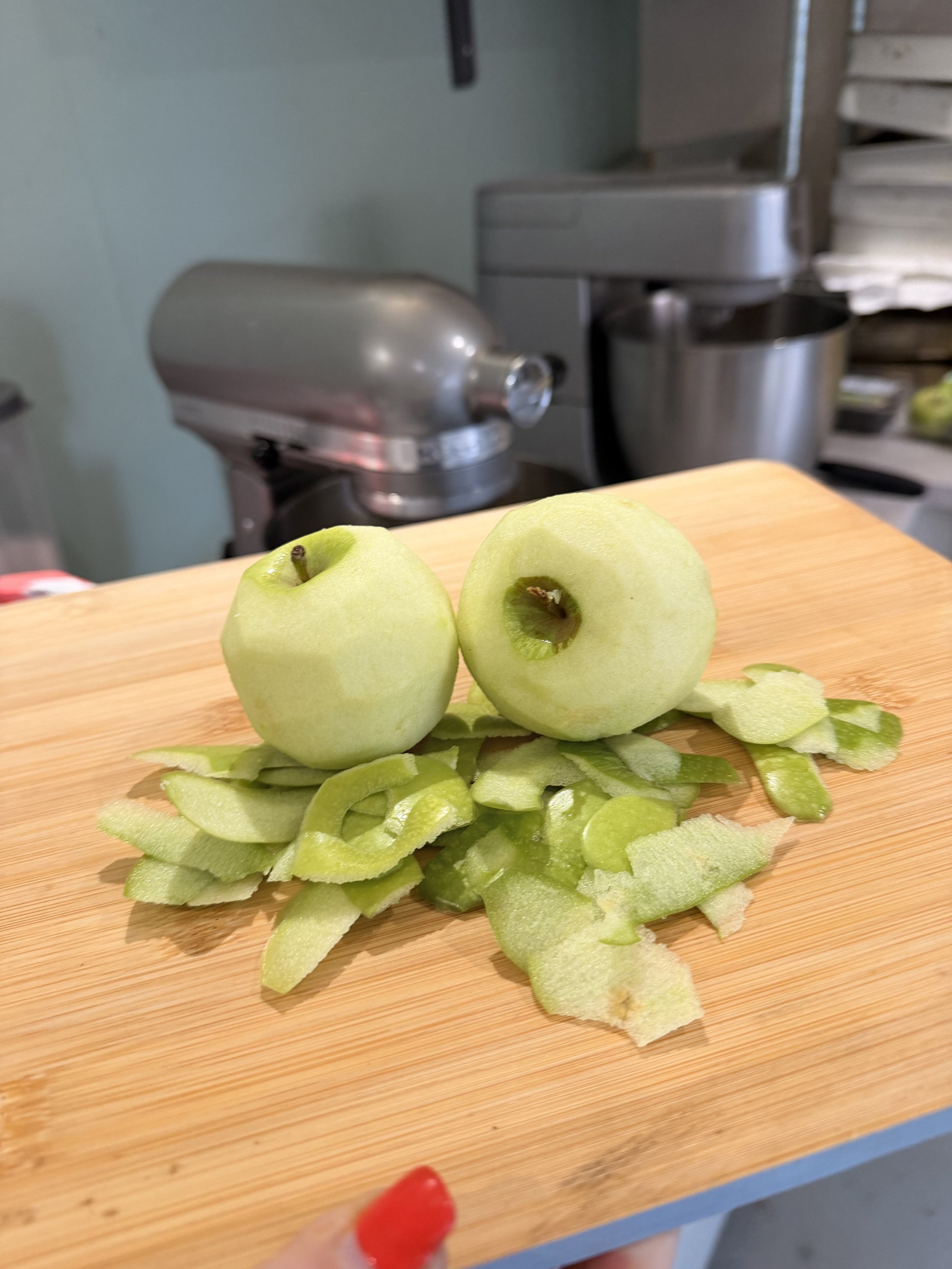 Fresh apples being prepared for Agápē apple crumble blondies