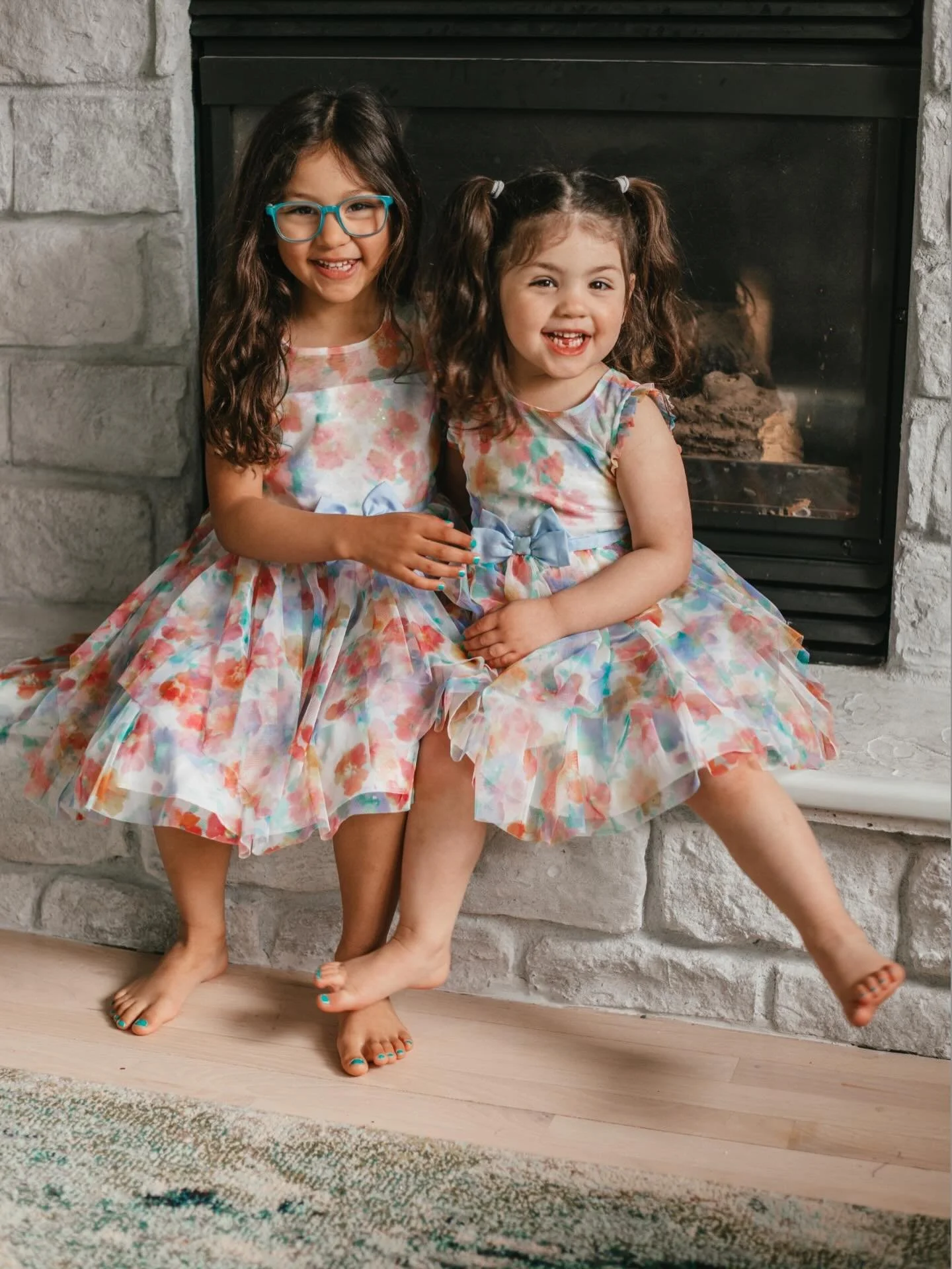 Not the matching dresses AND the matching missing teeth 😭 I&rsquo;m officially obsessed. Agustin Family Sneak Peek. 

Be honest&mdash;pineapple on pizza: yes or absolutely not? 🍍🍕

#JulesHawkinsPhotography #EasterPhotos #sisters #familysession #sn