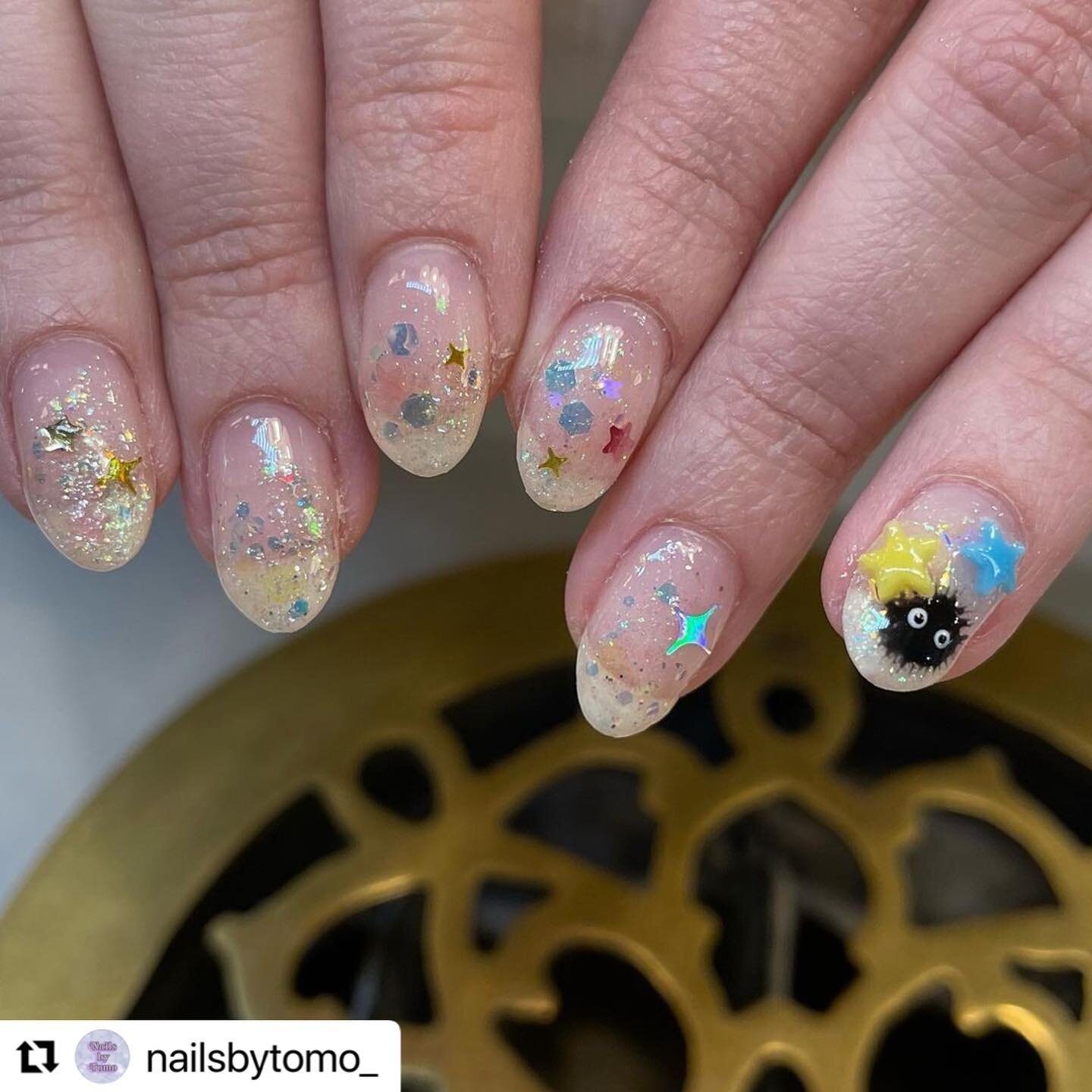 Make sure to get your appointments in with Tomo before she leaves at the end of April! 

#Repost @nailsbytomo_ with @use.repost
・・・
Soot sprite has sugar candies💛💙

#sootsprites #sootspritenails #spritedaway #spritedawaynails #まっくろくろすけネイル #金平糖ネイル #