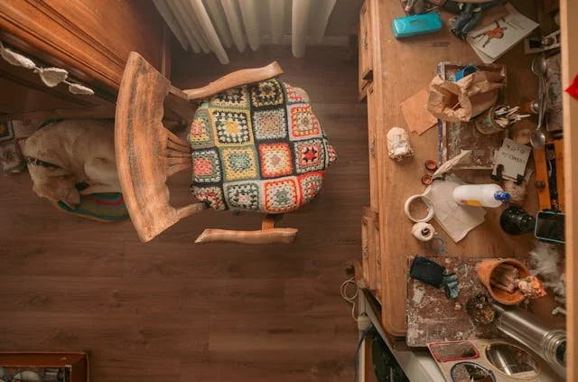 Cozy Craft Room with Quilted Chair and Sleeping Dog