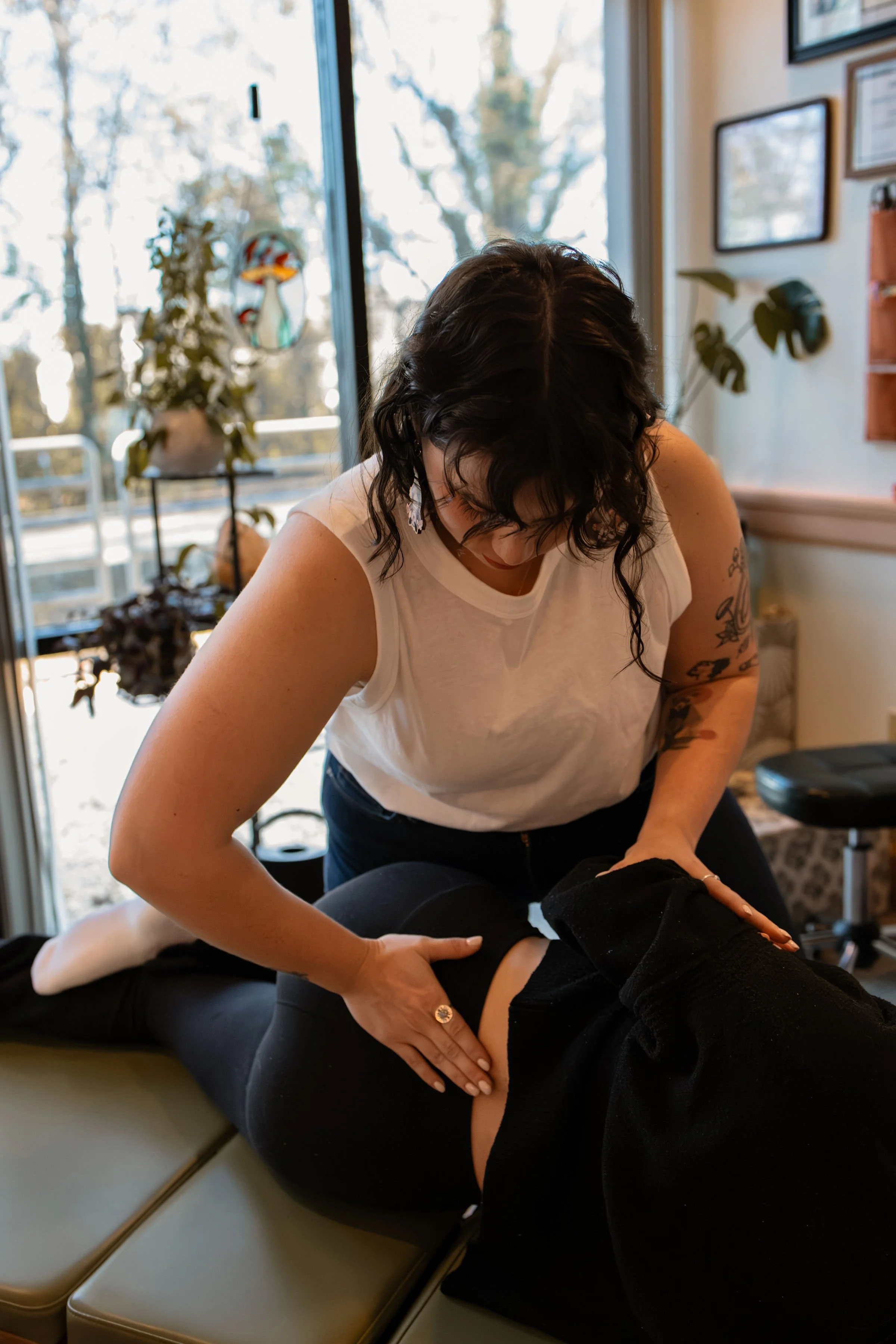 Dr.Andi doing a side posture hip adjustment