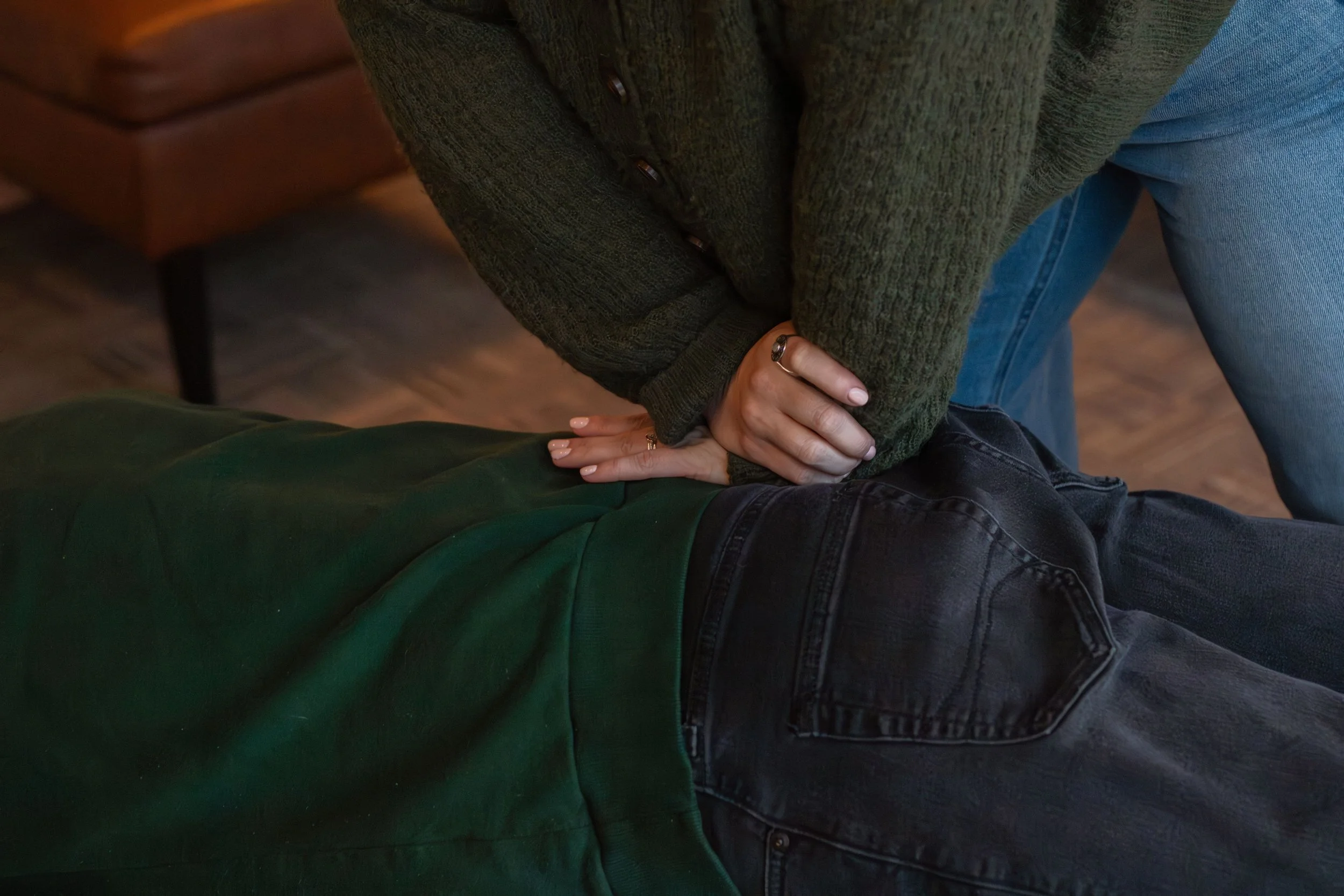 Dr. Andi performing chiropractic adjustment on hip