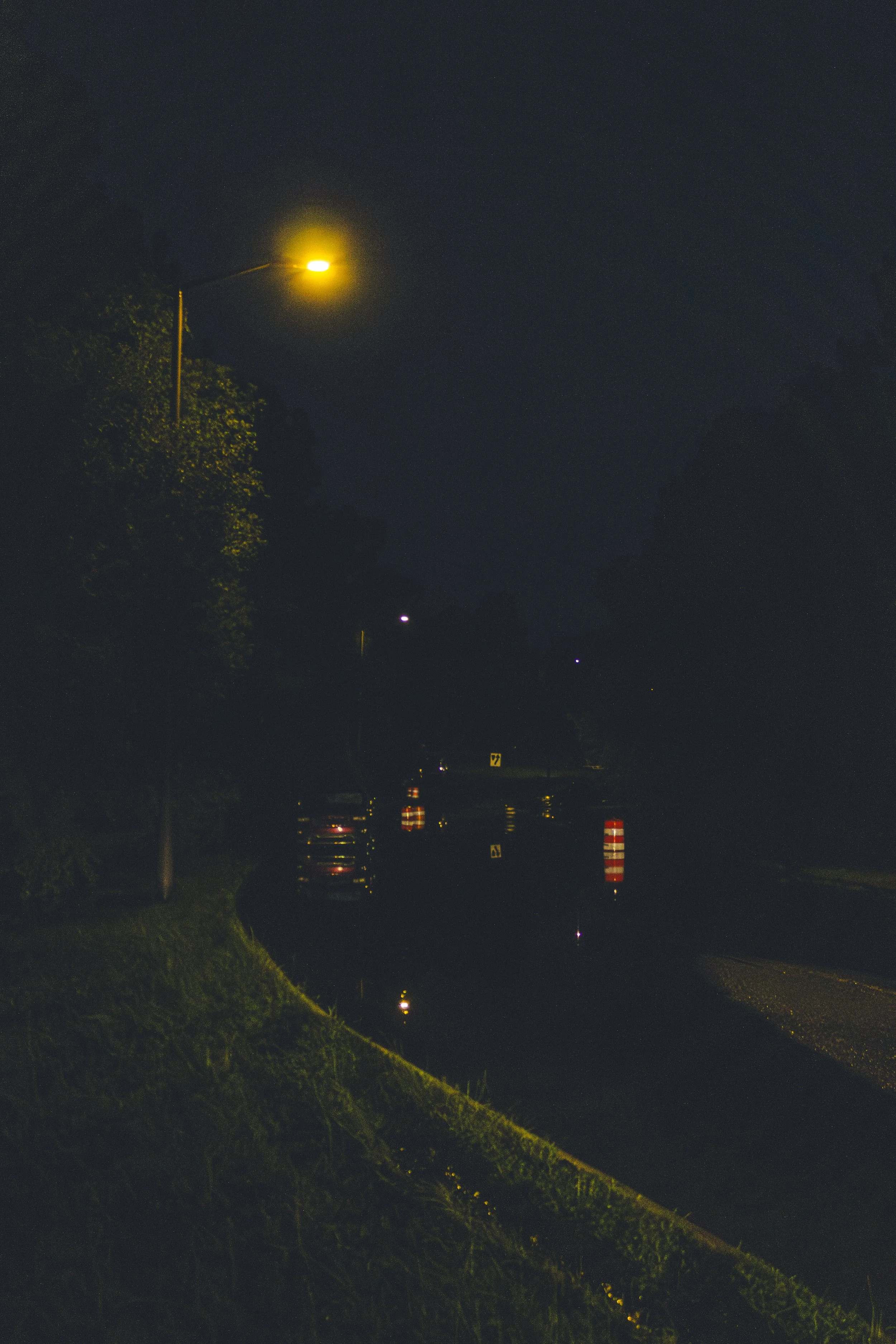 Bradley Boulevard with flooded water at night
