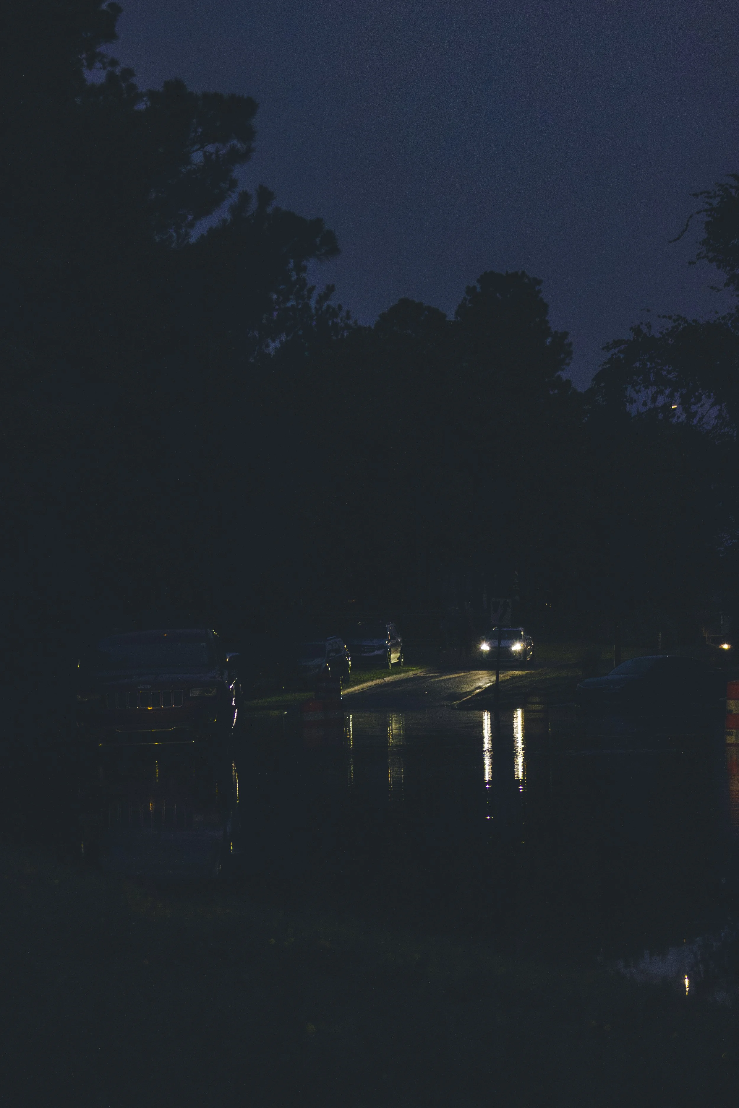 Bradley Boulevard with flooded water at night