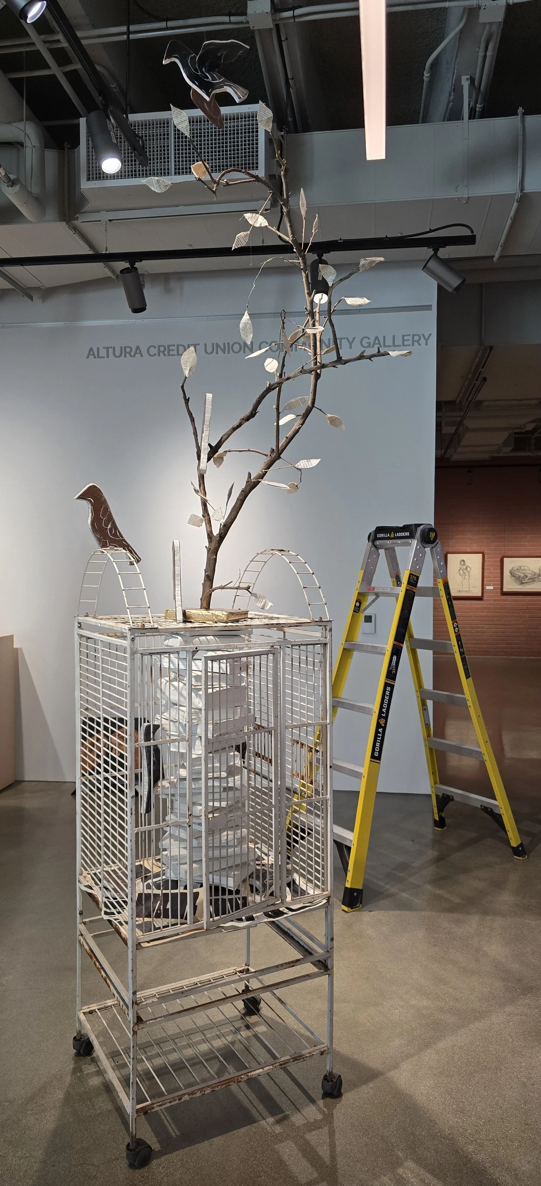 Title: Pages of Liberation
Medium: Sculpture
Size: 2.5’ x 2.5’ x 8’

About the piece: Pages of Liberation stands as a poetic reflection on how Black and Brown communities reclaim power, wisdom, education and beauty through creativity and collective m