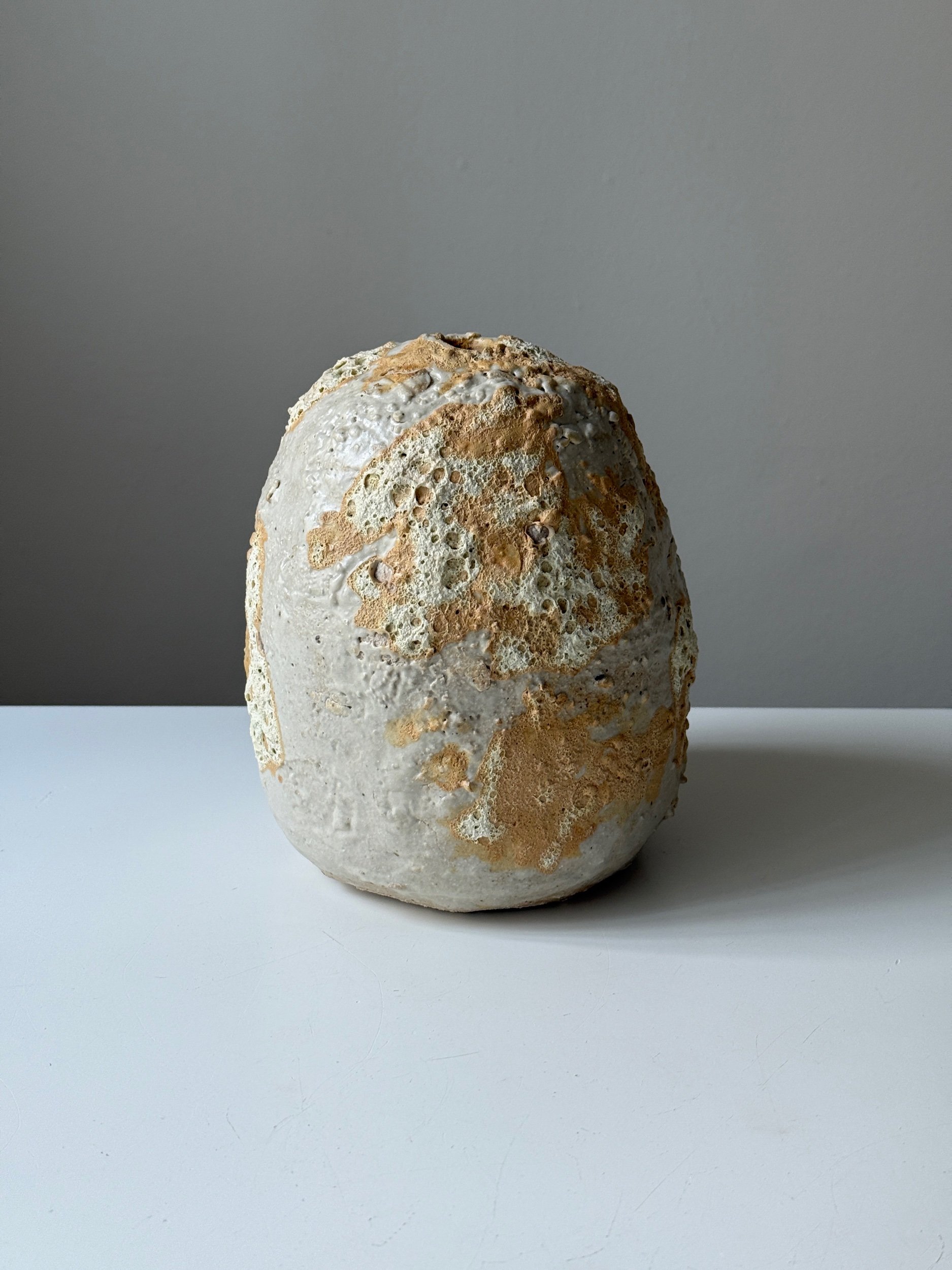 textured pottery bud vase with unique surface design