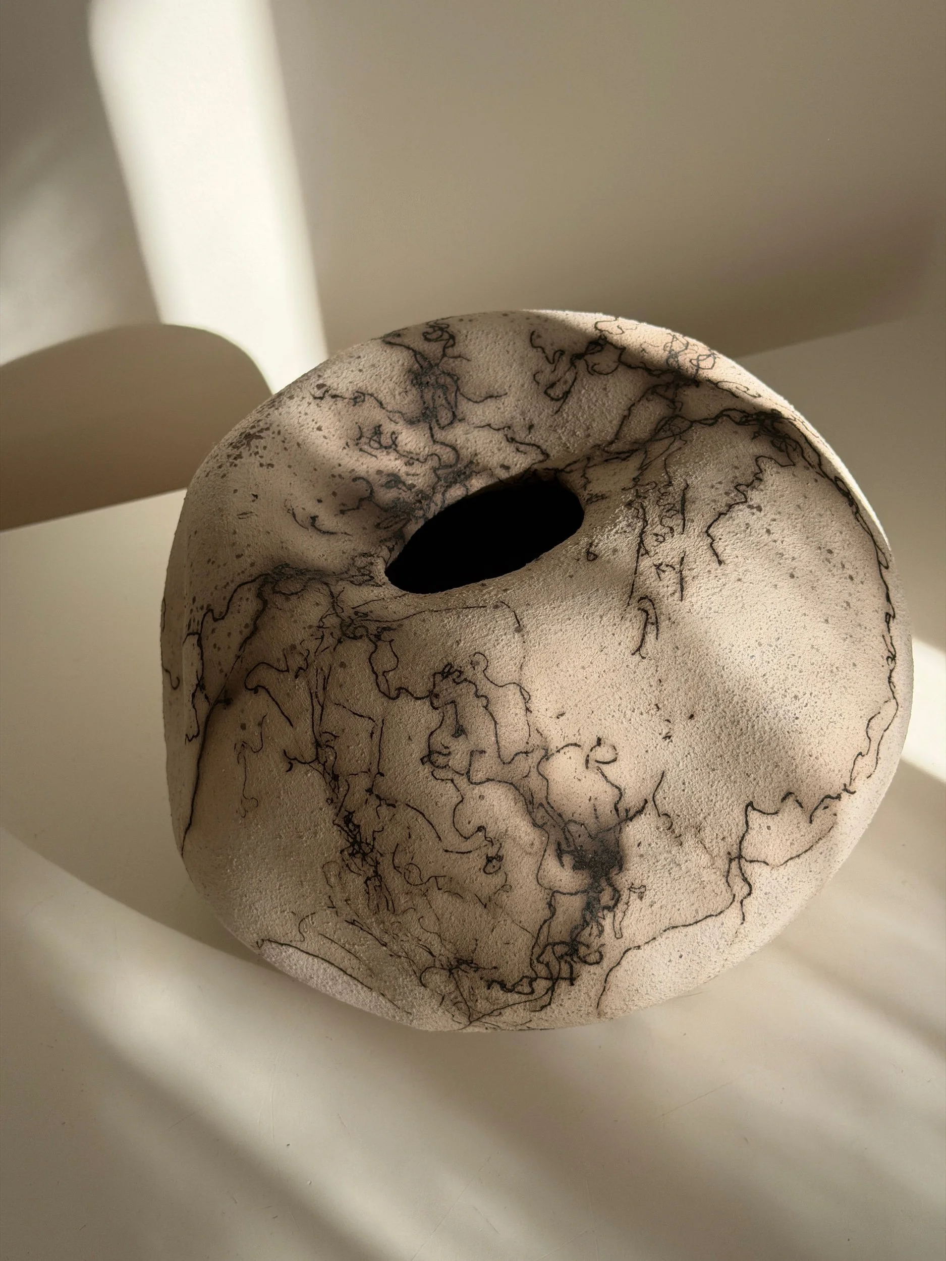 white and clack handmade ceramic vase