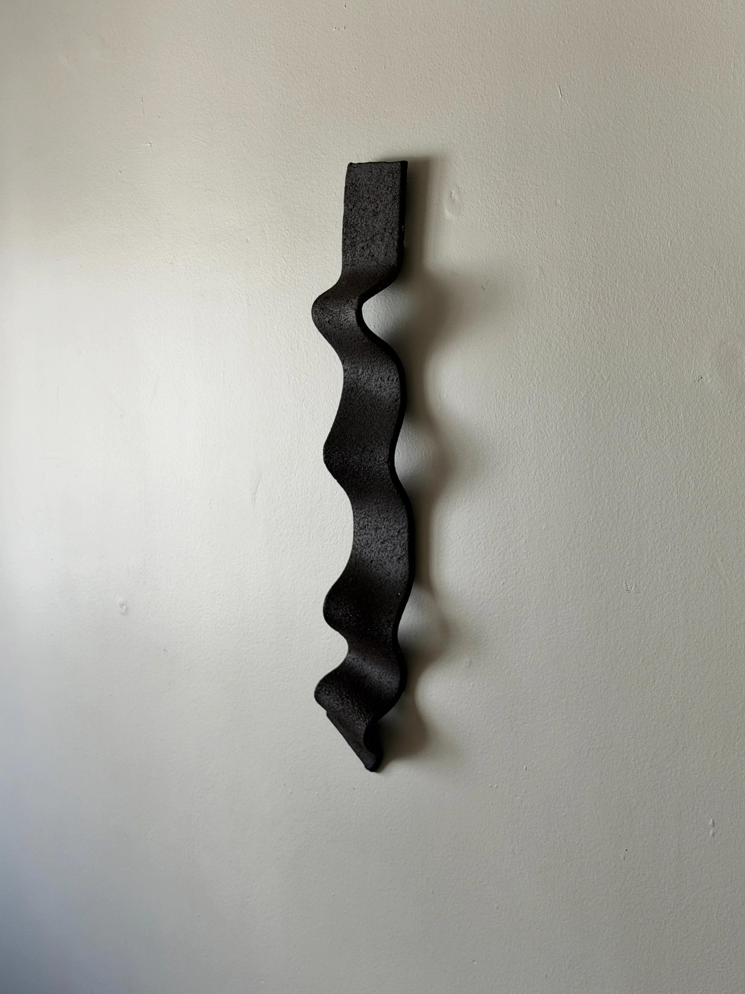 ceramic wall sculpture in black sculpture clay, wabi-sabi home decor