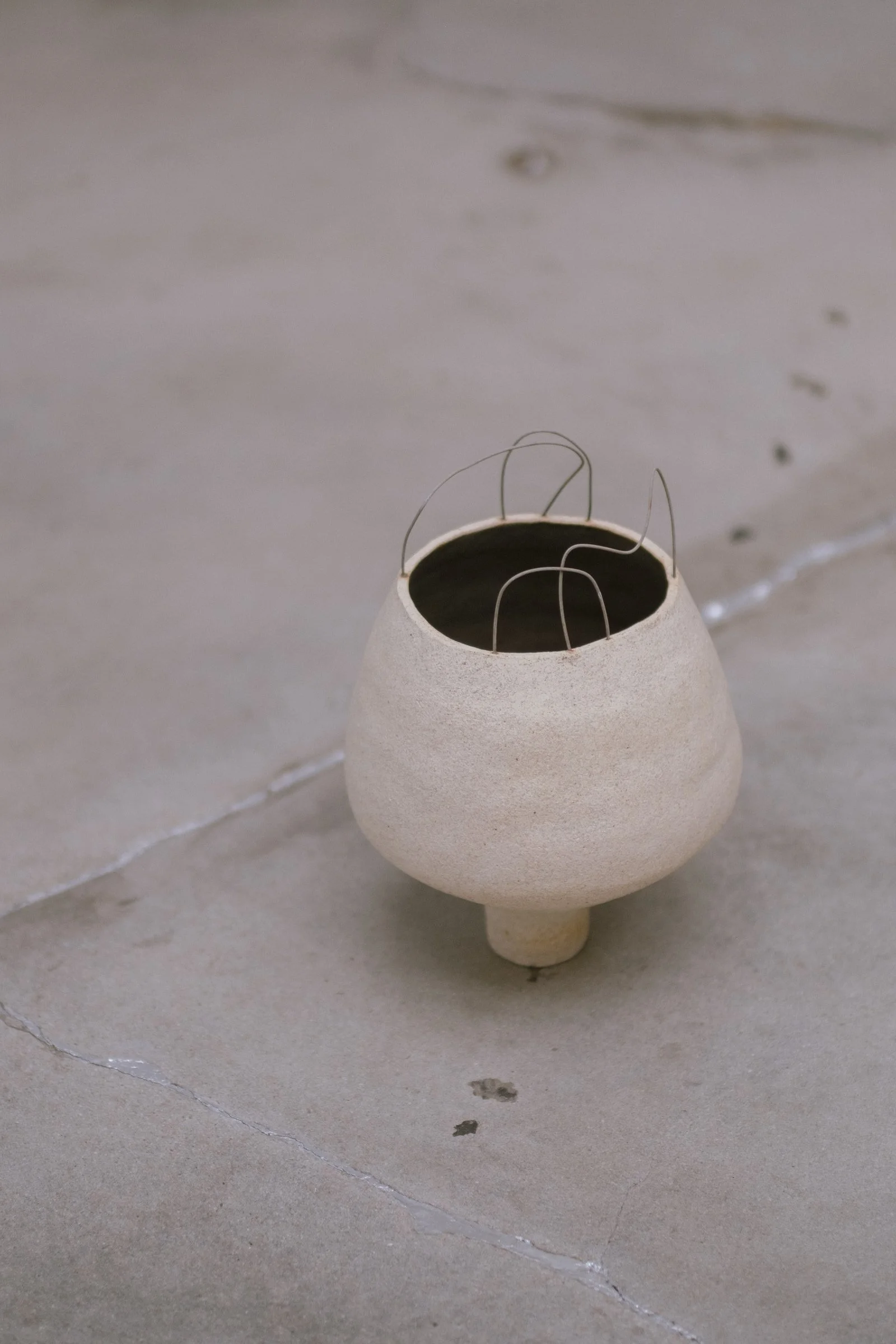 Large sculptural ceramic vessel by Anna Shipulina, shown on a gallery plinth — a one-of-a-kind work scaled for restaurant, lobby, and gallery installations.