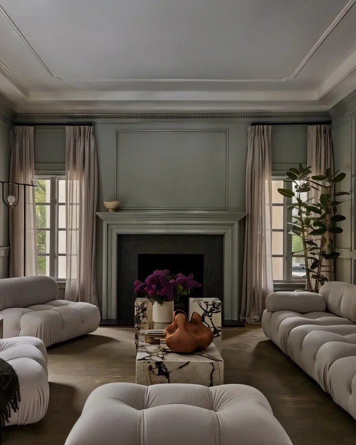 Handbuilt ceramic vessel by Anna Shipulina in a living room interior featured in Architectural Digest