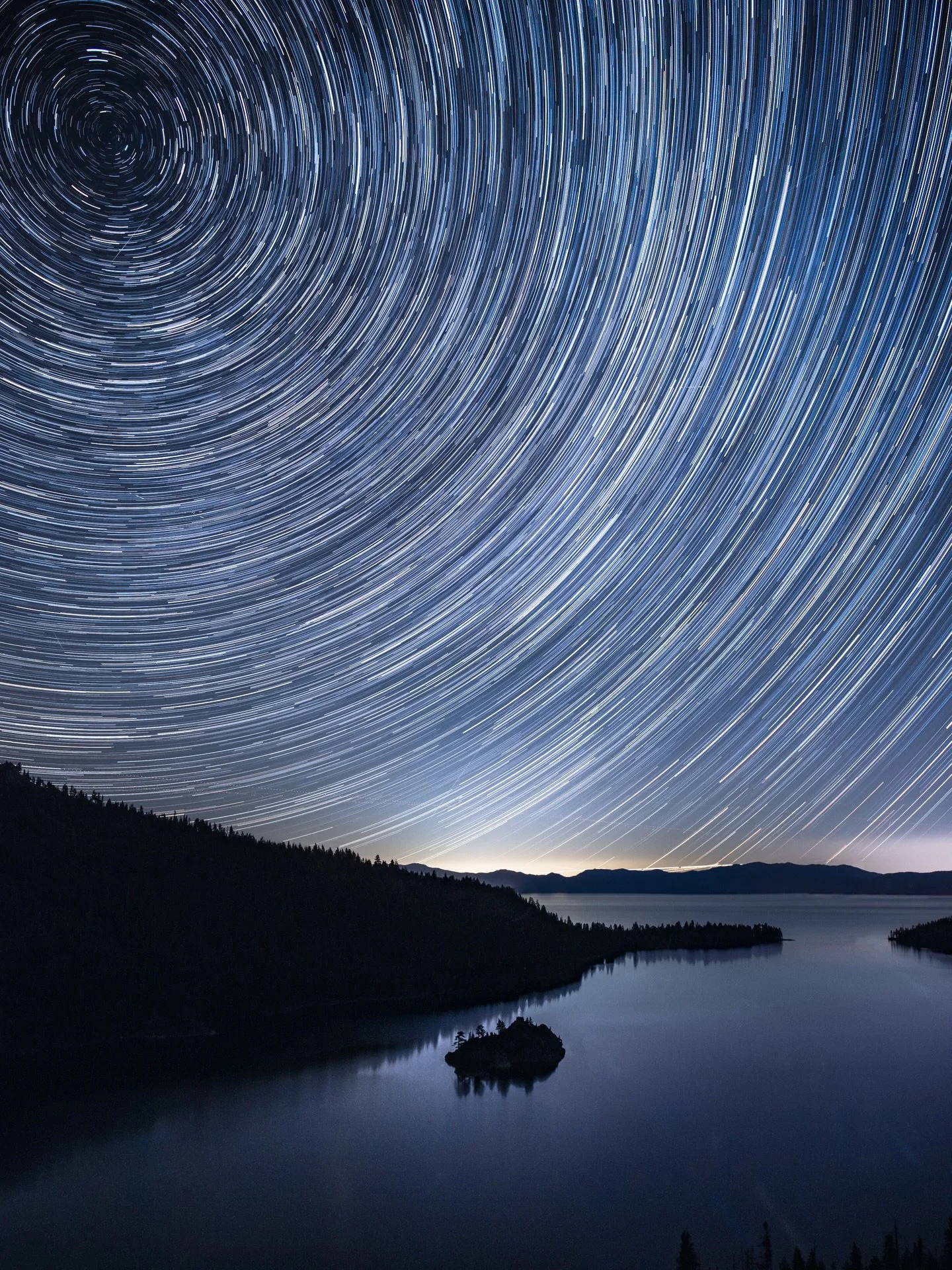Starry night over Emerald Bay. This image is comprised of 110 distinct photos captured during a one-hour interval showing the movement of our planet. The photos are then stacked on top of one another in post creating a series of star trails.

Prints 