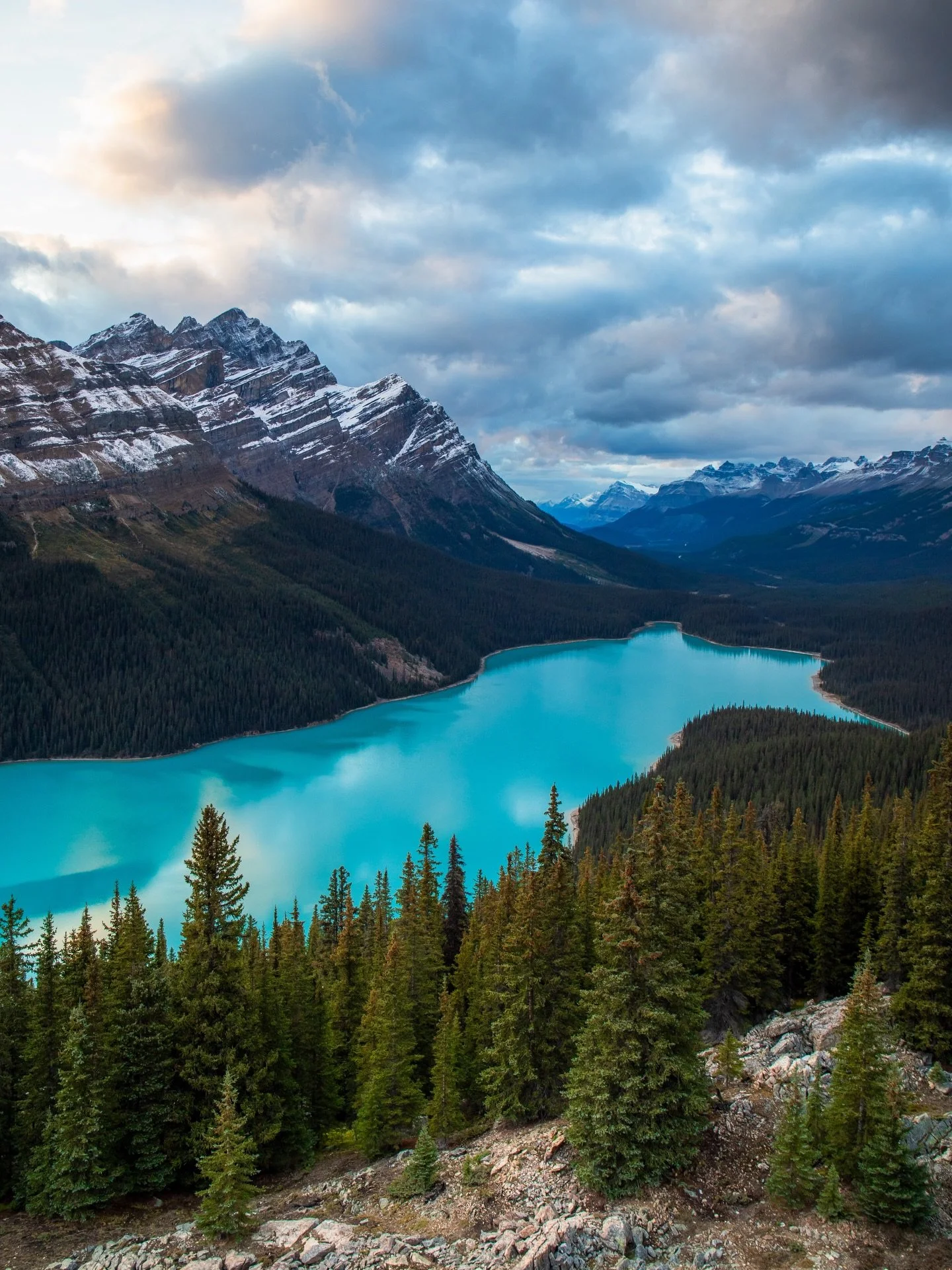 Same lake, two different vibes.

Probably my favorite place in the Canadian Rockies, this glacier-fed lake mesmerizes with its striking blue hue. The vibrant color comes from &ldquo;rock flour,&rdquo; a fine dust created as the glacier grinds down th