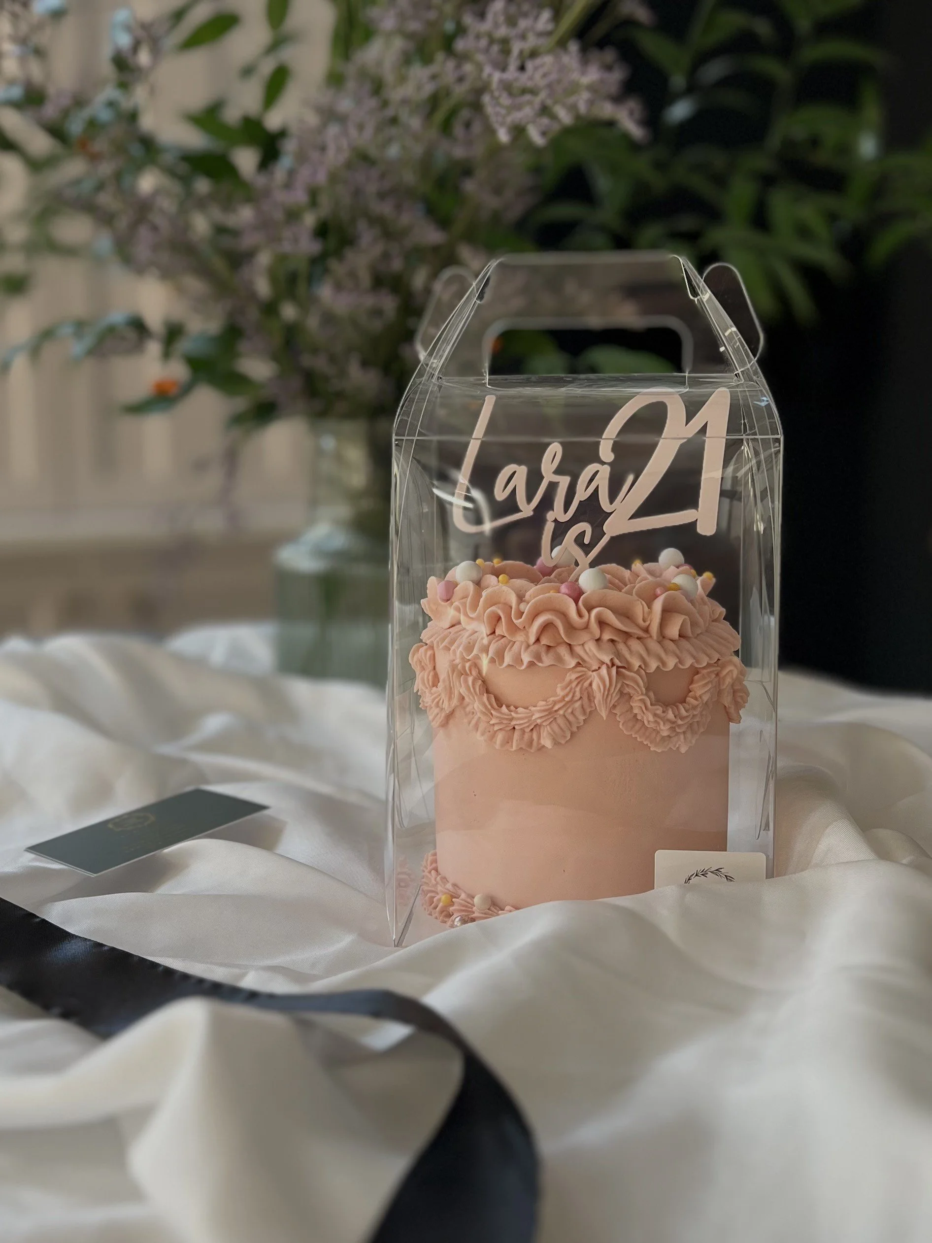 Mini vintage 21st birthday cake in a soft pink with cake topper