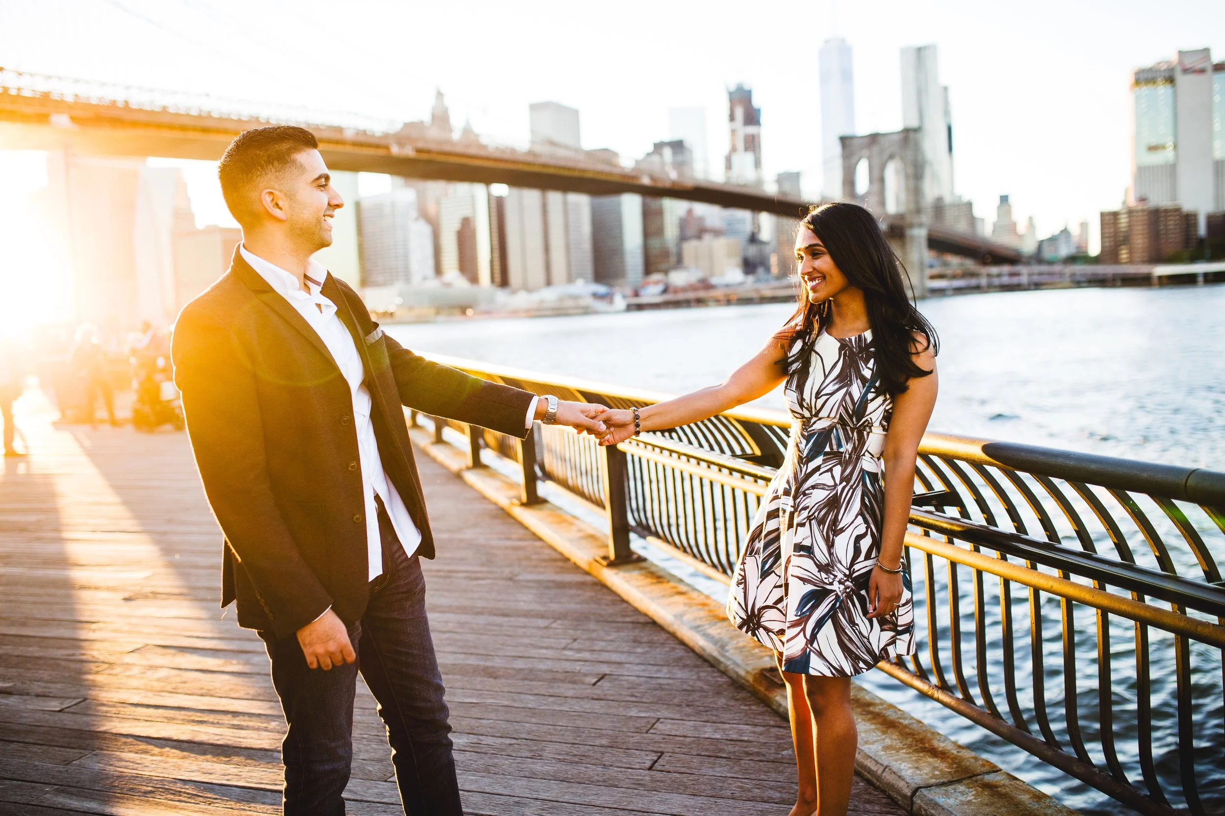 indian couple engagement session at brooklyn bridge park in dumbo brooklyn during sunset