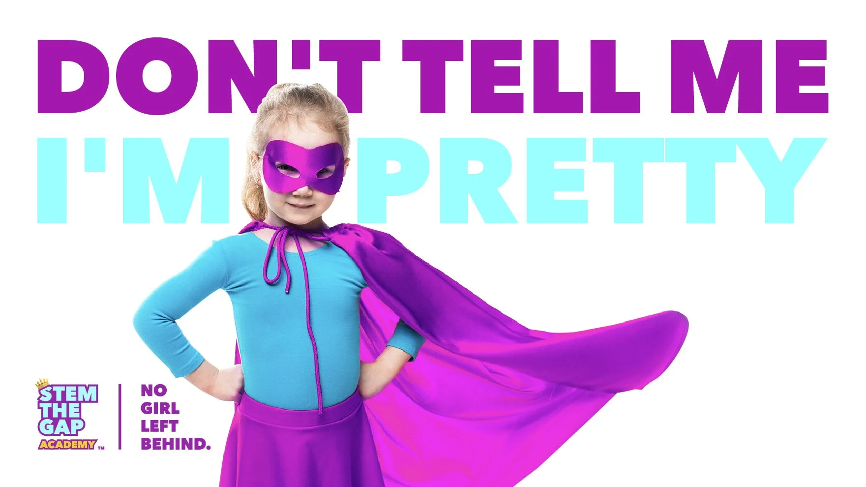 Girl dressed as a superhero standing confidently, symbolising girls’ strength and empowerment beyond appearance.