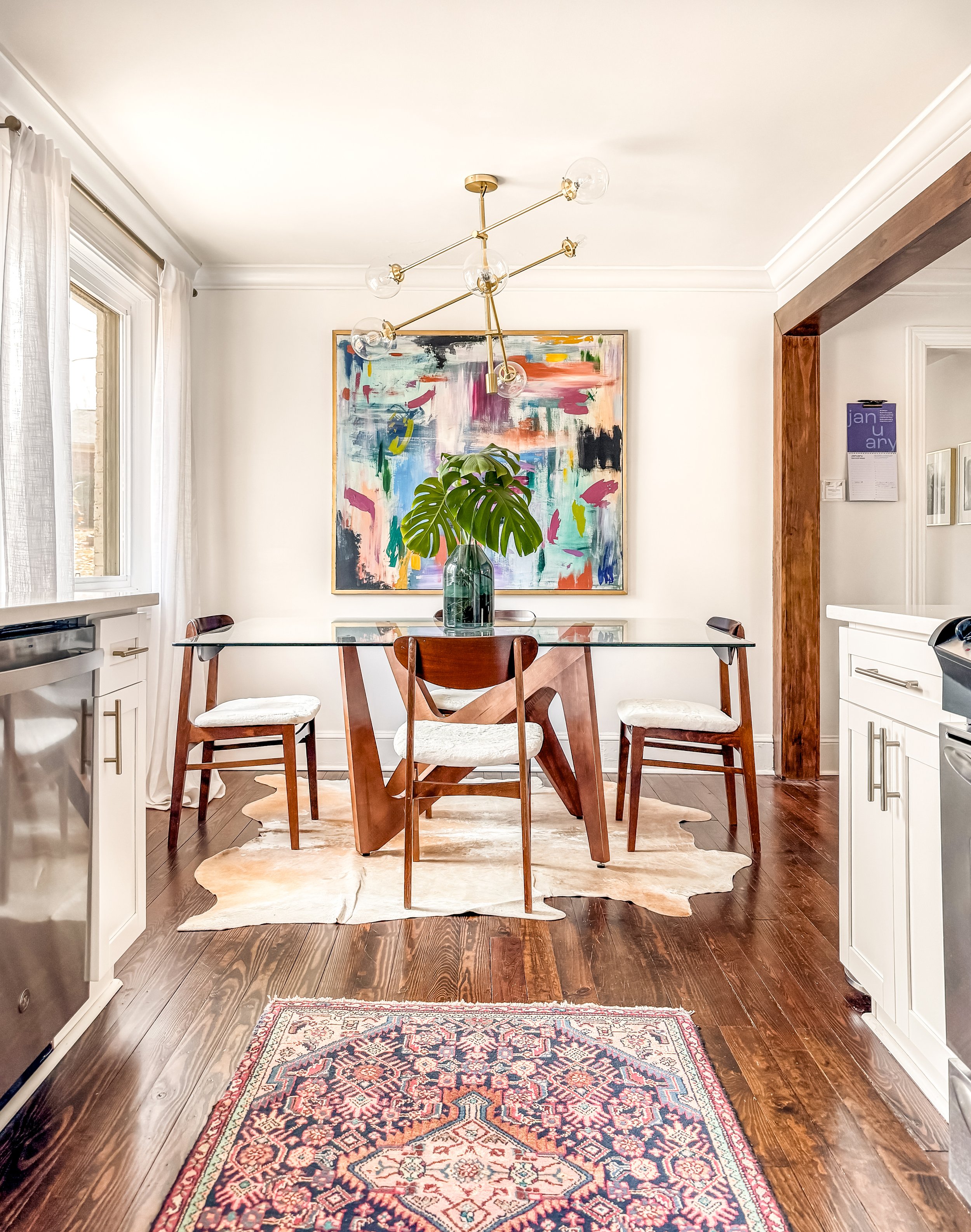 Bright mid century dining table with four chairs