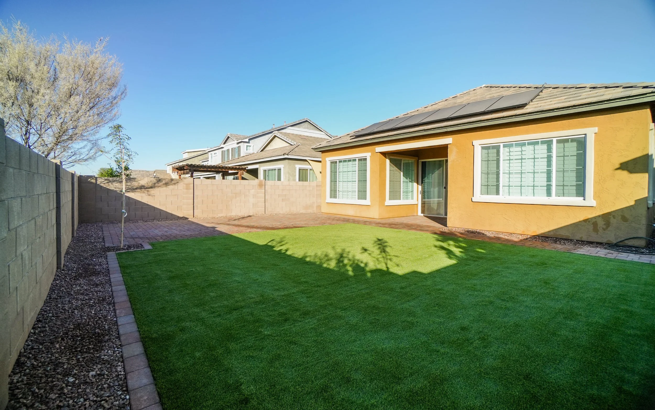 Turf and paver installation by Better Life Landscape & Design near Phoenix
