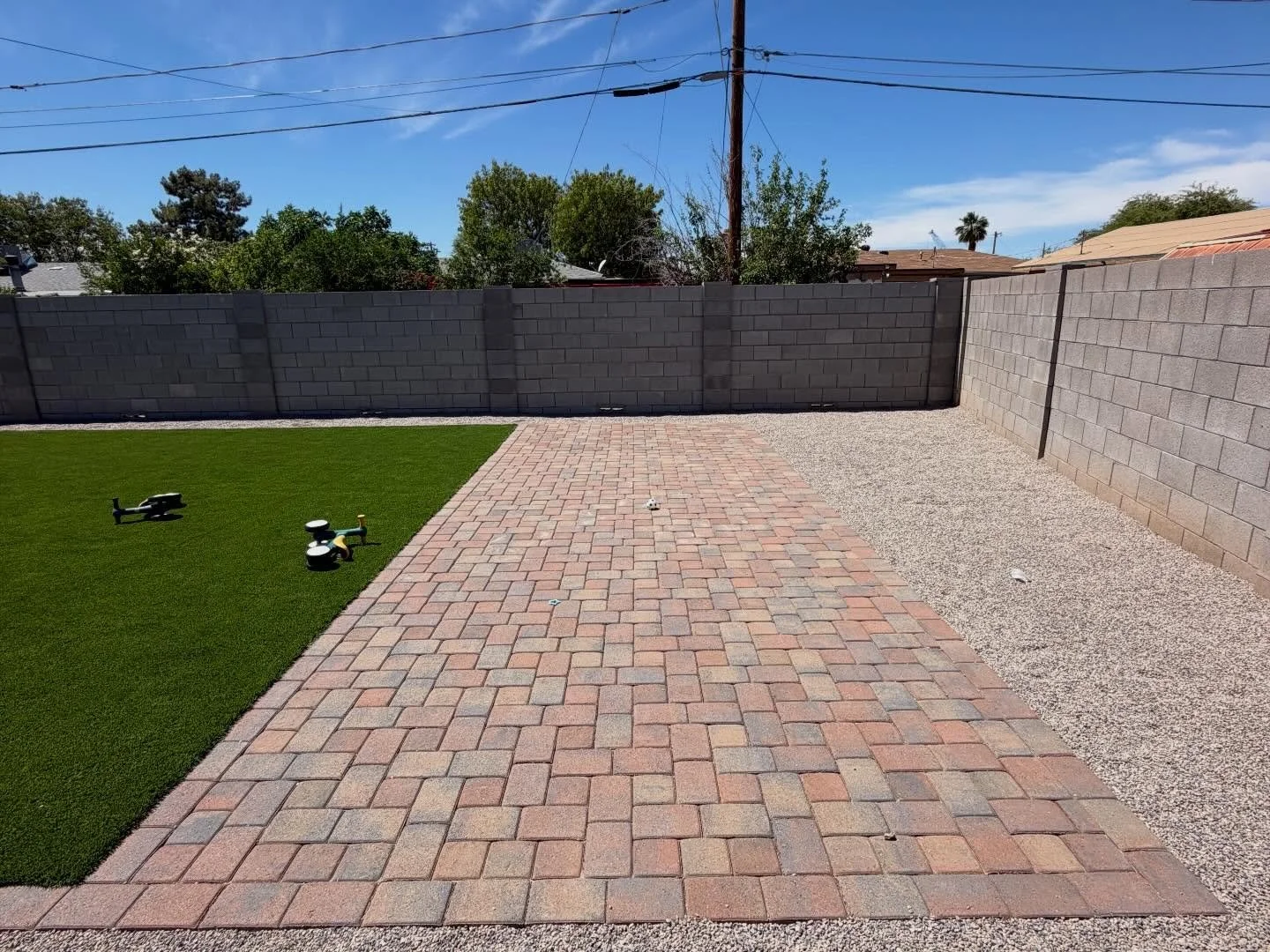 Paver Installation at this local backyard in Phoenix by Better Life Landscape and Design