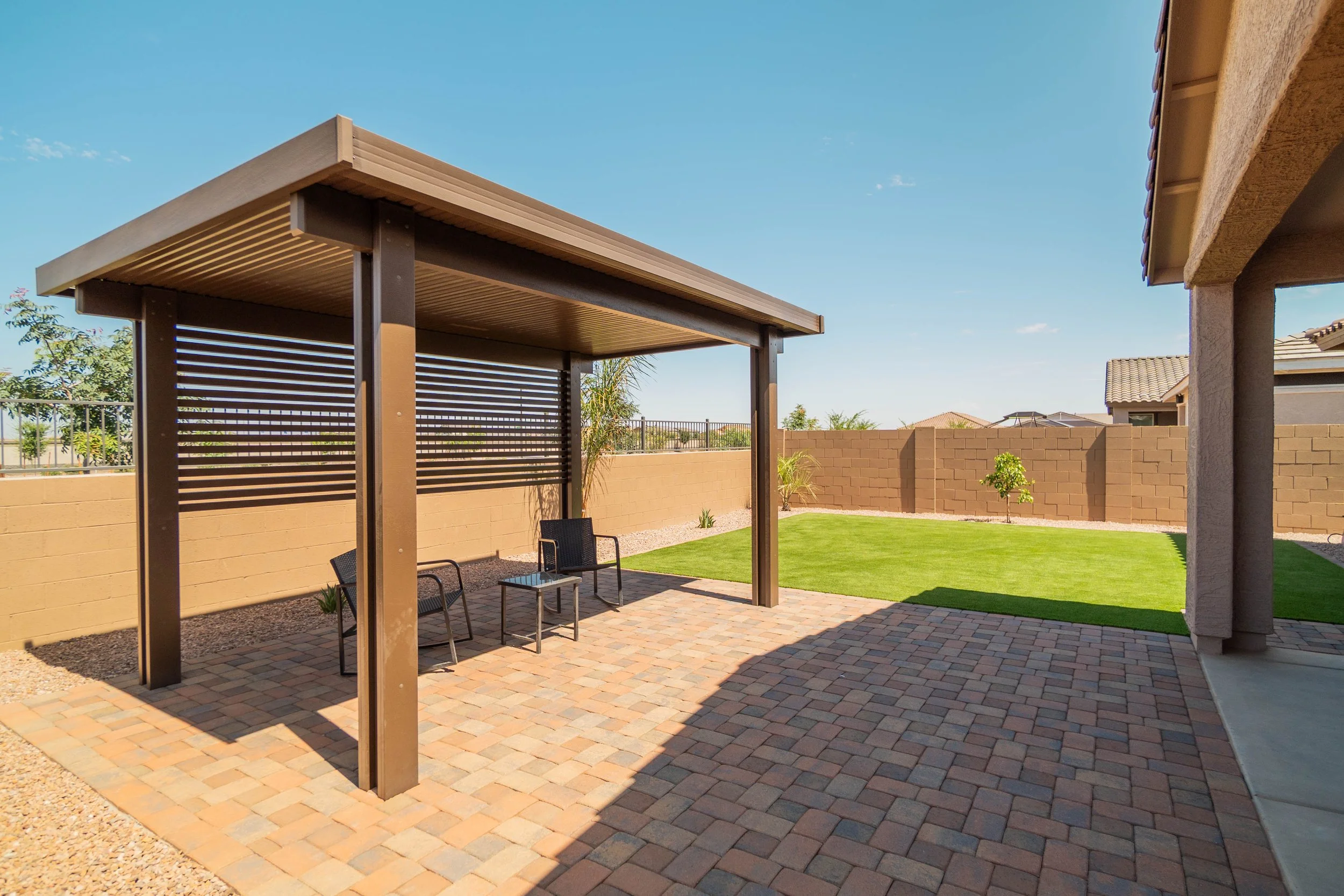 Pergola installation at this new build construction home by Better Life Landscape & Design near Queen Creek, AZ