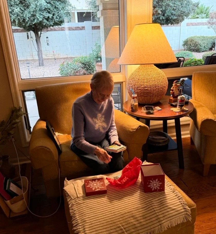 26 - Exchanging gifts on Christmas morning. We were glad that we could be with Sandy on Christmas this year.