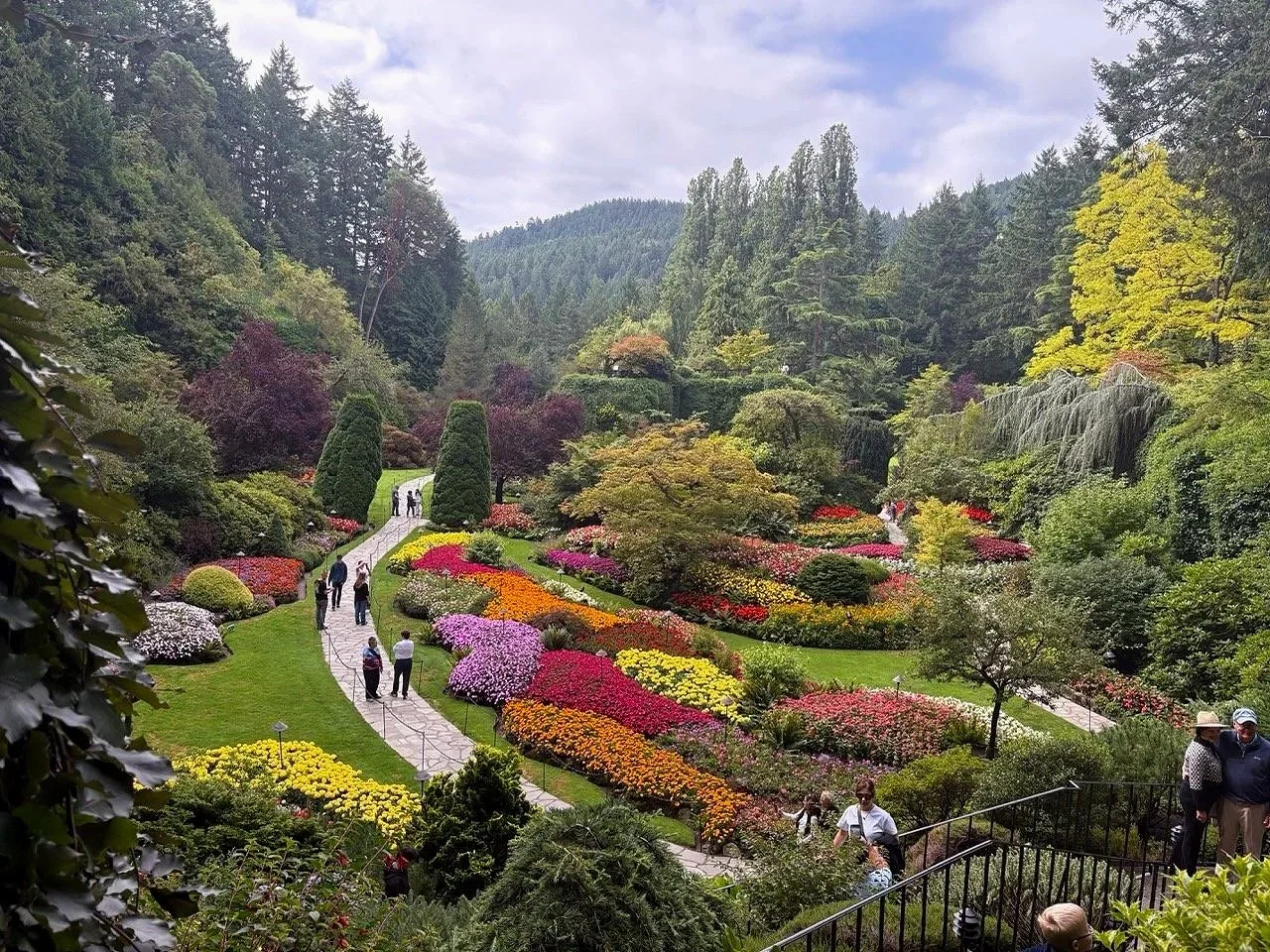 23 -	The gardens were the brainchild of Jennie Butchart, whose husband founded a limestone quarry at the site. She began planting and landscaping over the quarry in 1912. 