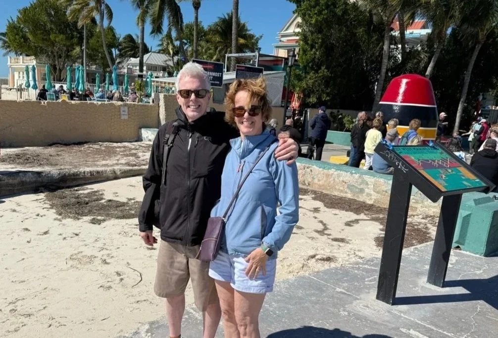 19 - That red, black, and yellow "buoy" in the background is the southernmost point of the continental US.  Well, that's not exactly true -- the actual buoy (and southernmost point) is behind us to the left a couple hundred meters, but it's currently