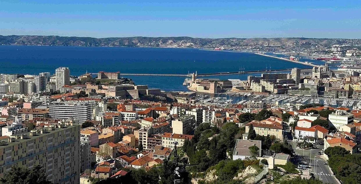 77 - This view from the church shows the Vieux-Port at the center right. 