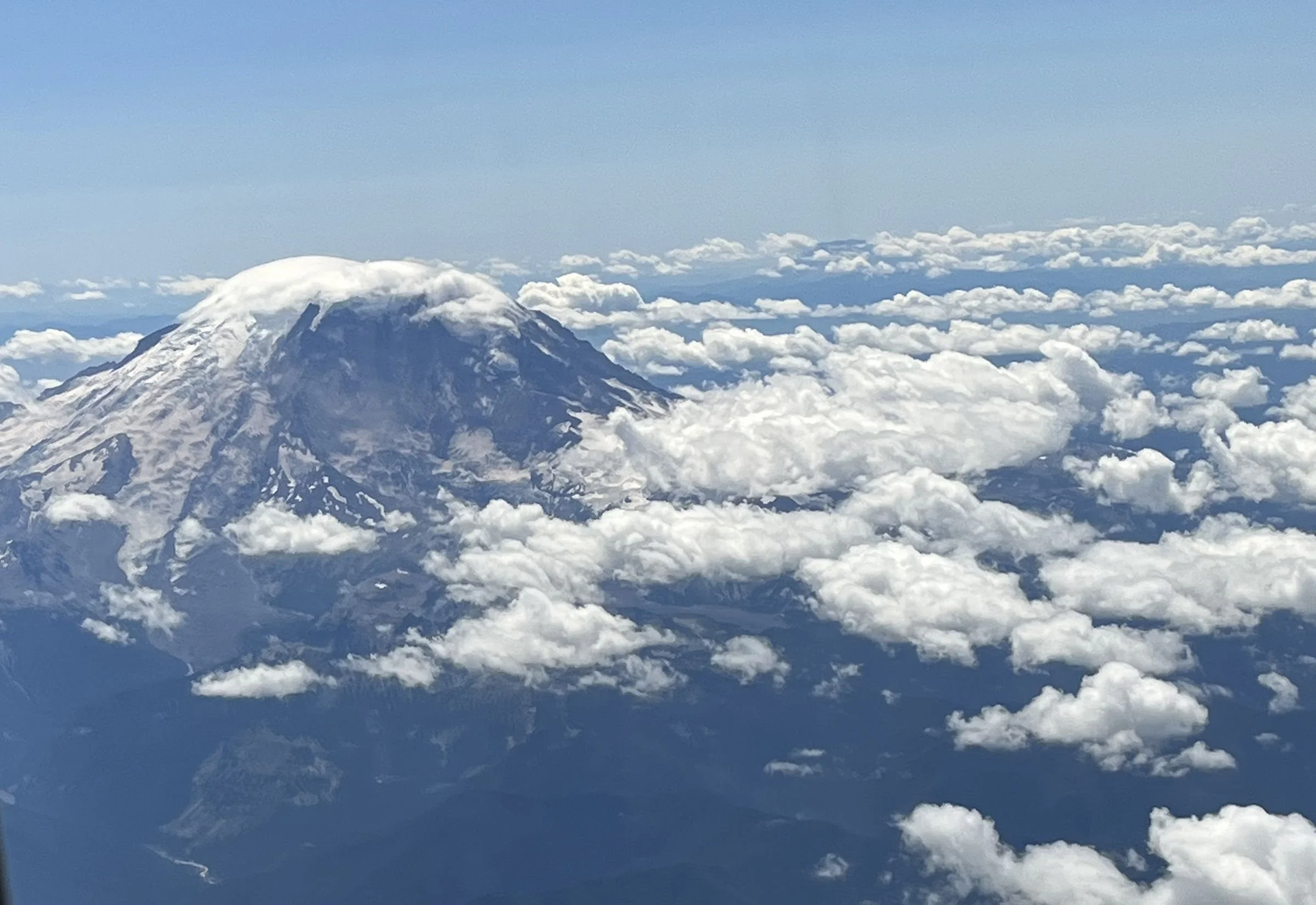 02 - Julie snapped this crazy cool photo of Mt Rainier as our flight approached Seattle.