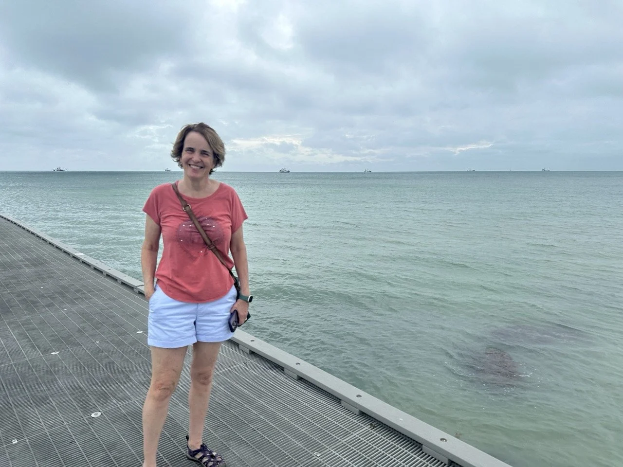 08 - Julie, overlooking the Gulf of Mexico.  Those are shrimp boats in the distance. 