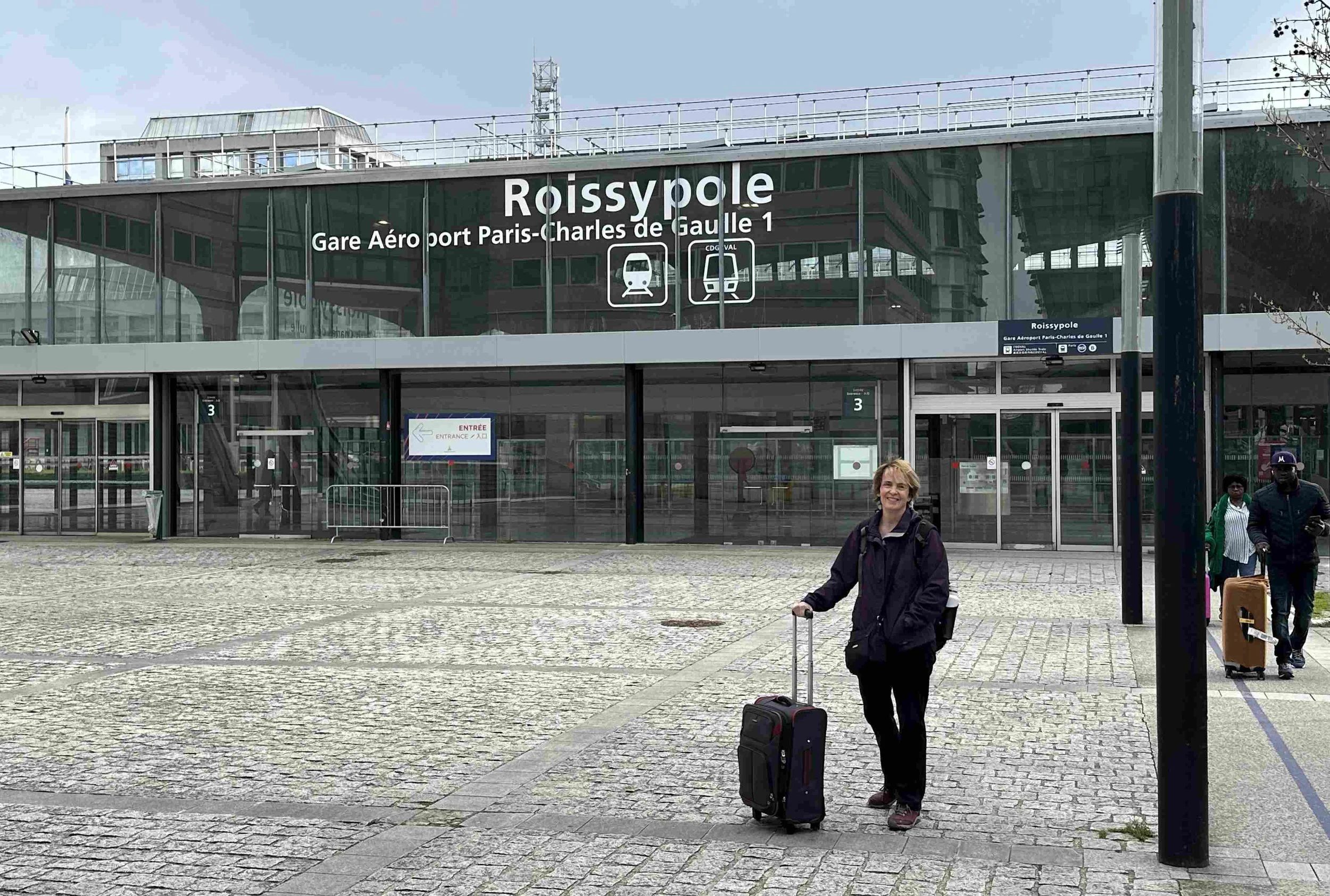 02 - We booked a day-use hotel at the Paris airport, so we could catch-up on our sleep before heading into the city. Here's Julie outside the airport train station, after our refreshing naps.