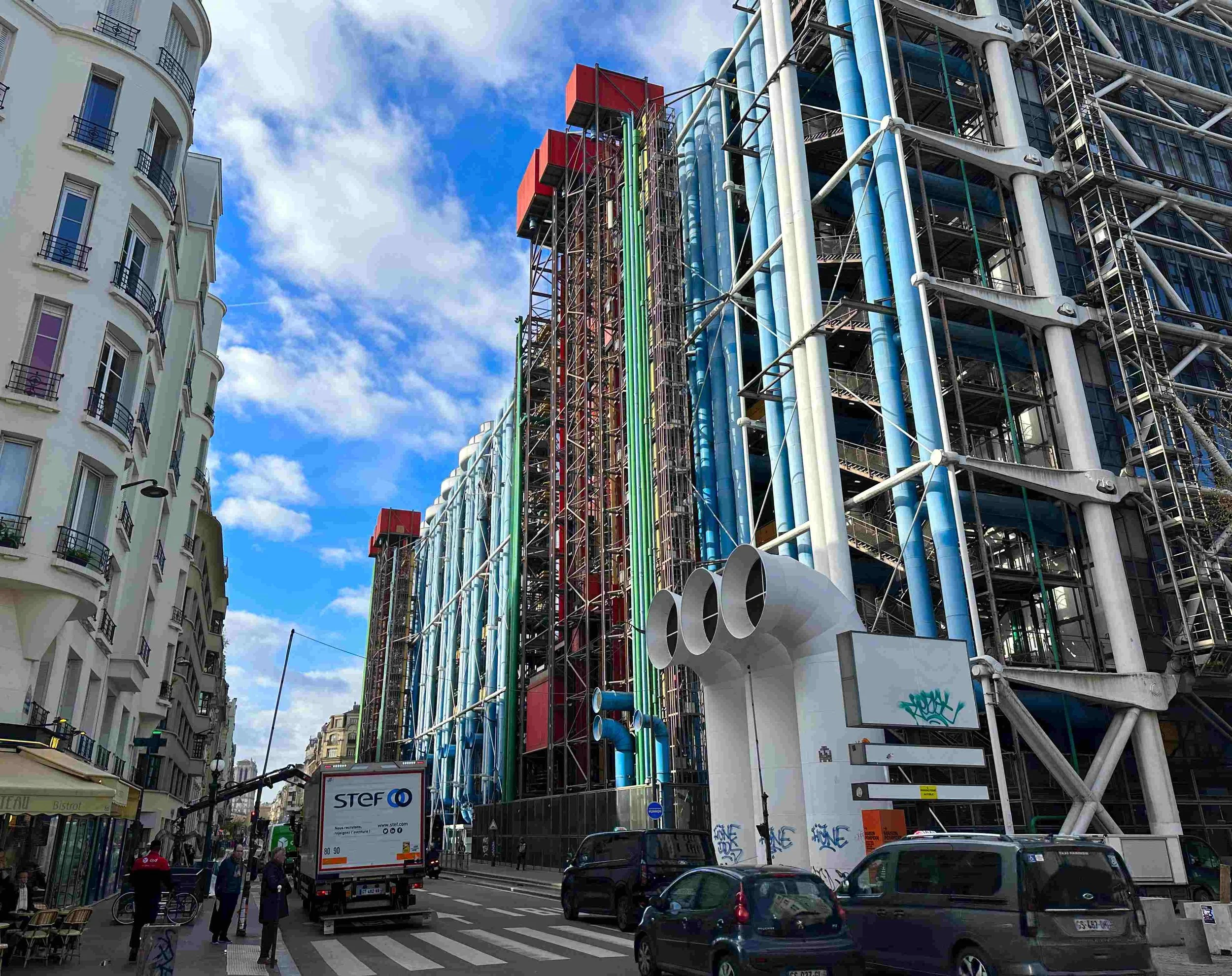 22 - What's this crazy building?!   Nobody knows -- it just appeared one day in 1977.  (We'll let you in on a little secret -- it's the Pompidou Center, an art museum.)