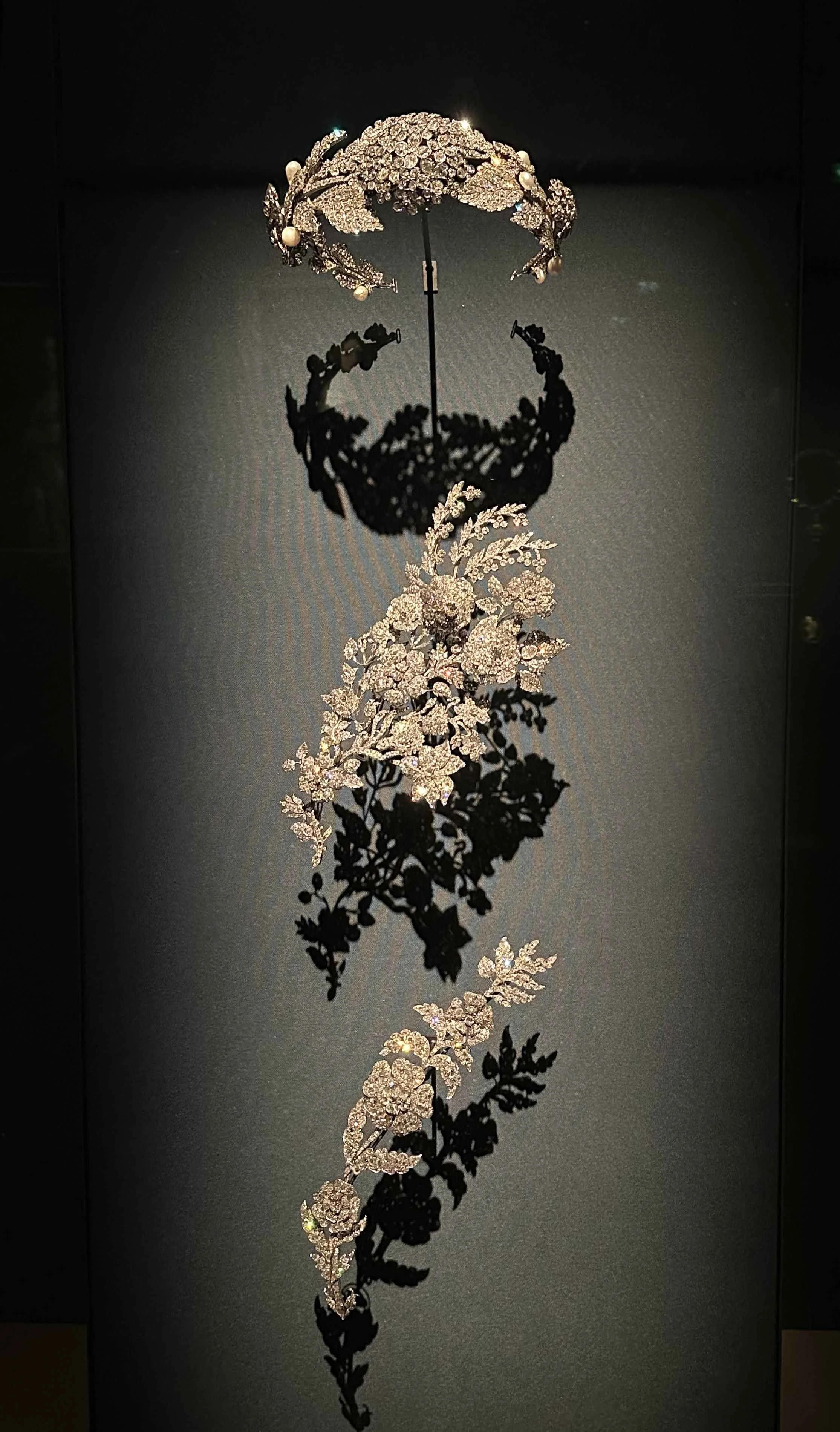 13 - A close-up of a tiara and broach set.  In 1792, the Hôtel was the site of a massive theft of French Crown Jewels during the French Revolution.  Most of the stolen items were never recovered.