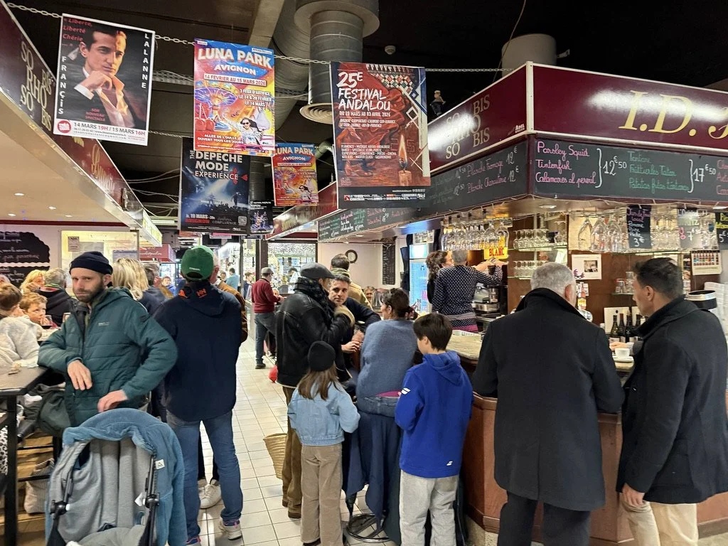 54 - Lots of people hanging-out at Les Halles, including one very suspicious-looking man.  Can you spot him?