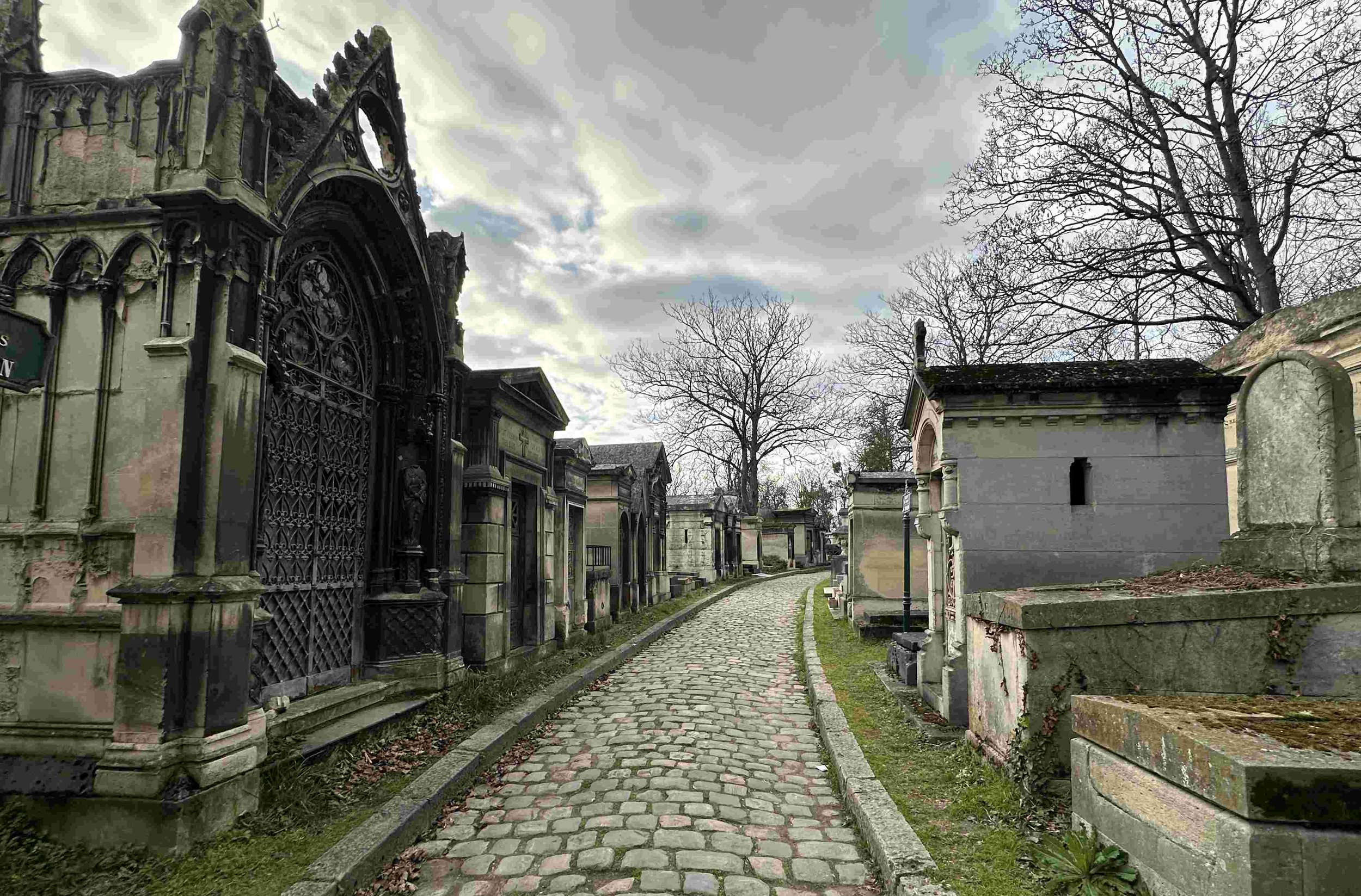32 - Paying a visit to the eerie Père Lachaise Cemetery, which opened in 1804.  With 3.5 million visitors annually, it is the most visited necropolis in the world.  A necropolis is a large, ancient cemetery containing elaborate monuments and burial s