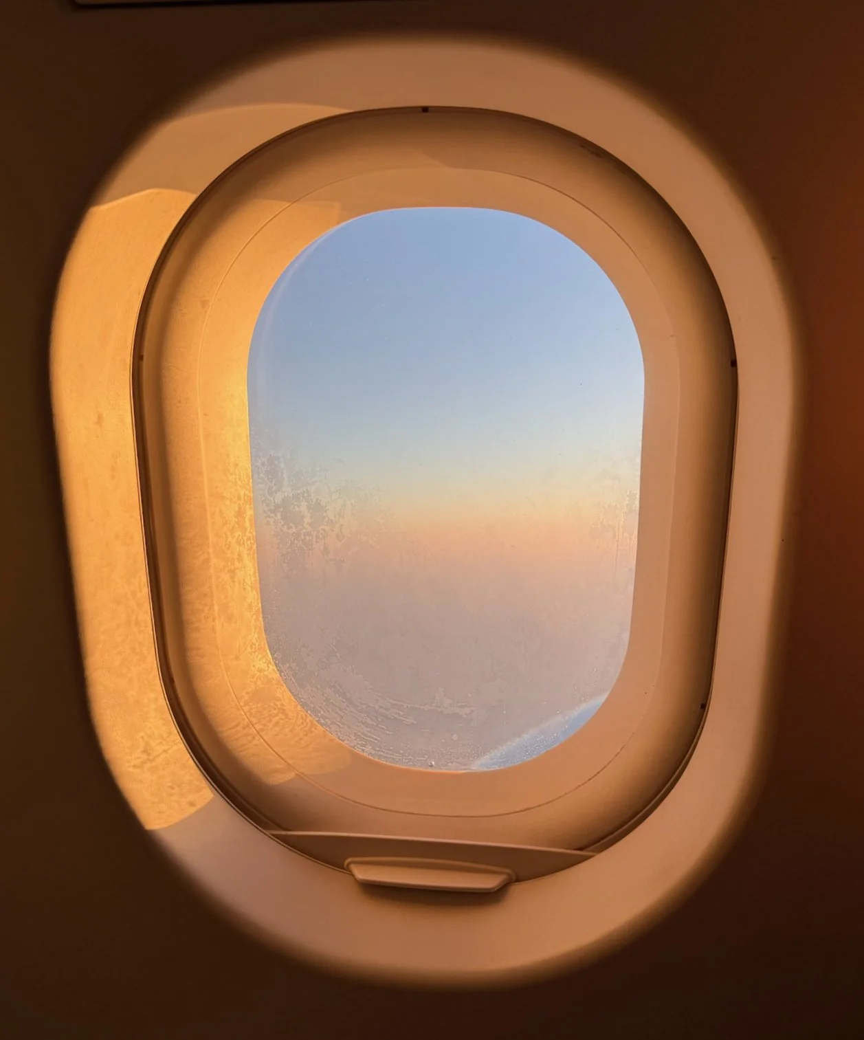 94 - An eerie photo snapped somewhere over the Atlantic or Canada during our return flight.