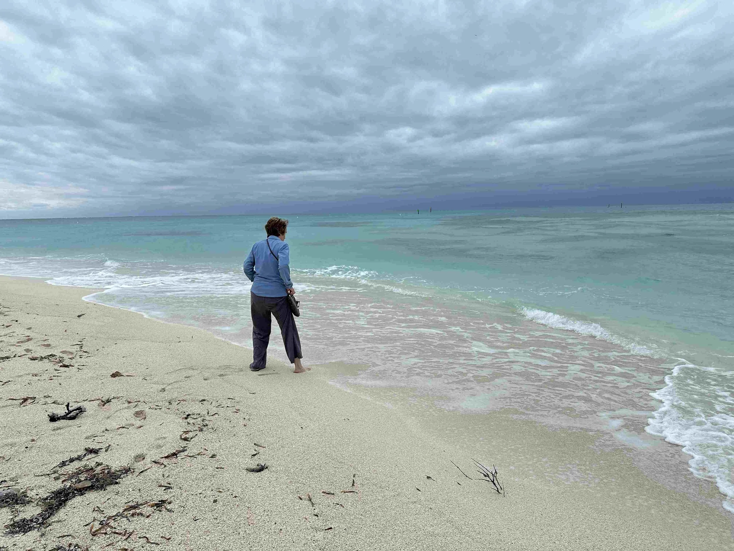 35 - Julie tests the water and proclaims it's just too darn cold for snorkeling. Disappointing, since Dry Tortugas is a snorkeler’s wonderland and home to some of the most vibrant coral reefs in the United States. Oh well...