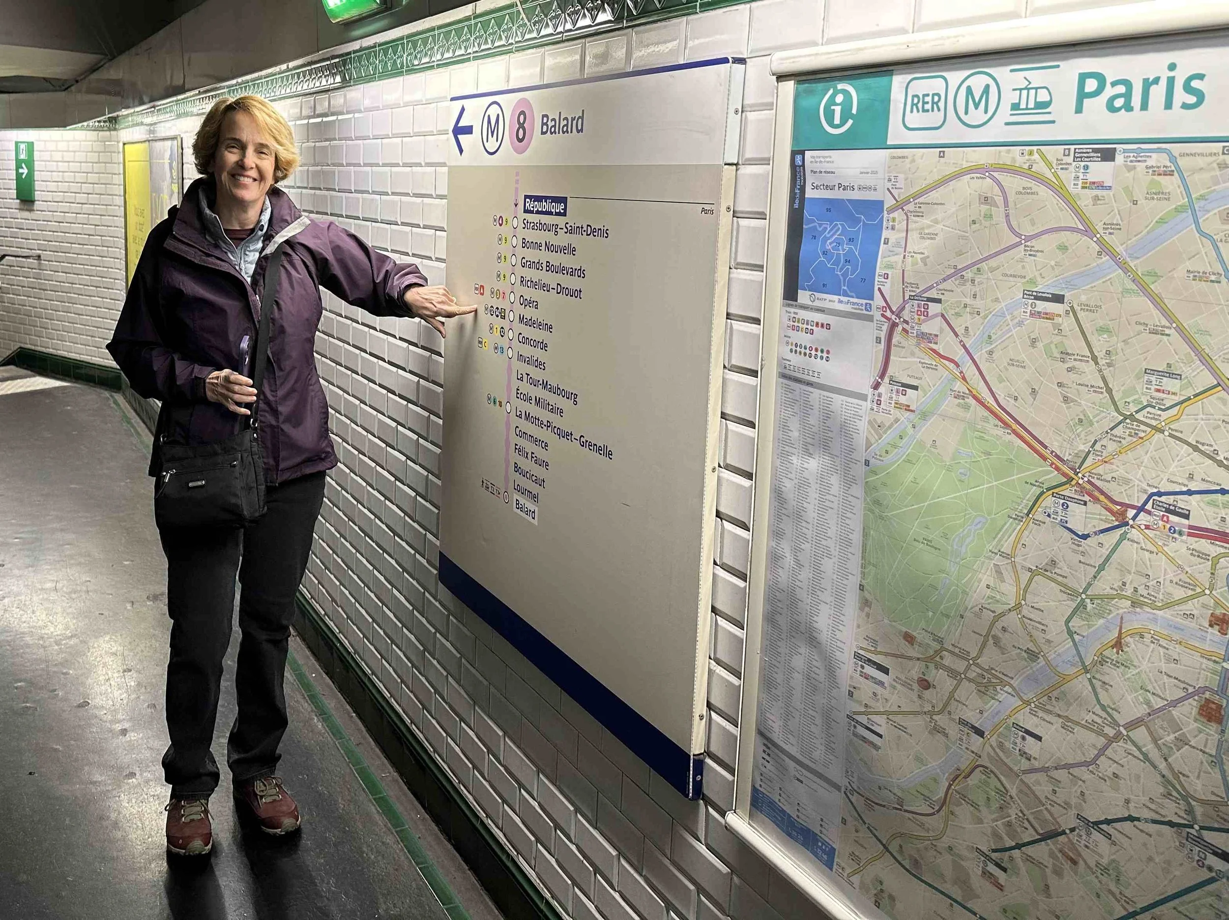 08 - Ready to do some exploring in the city center of Paris.  Julie has found our upcoming metro stop on the map.