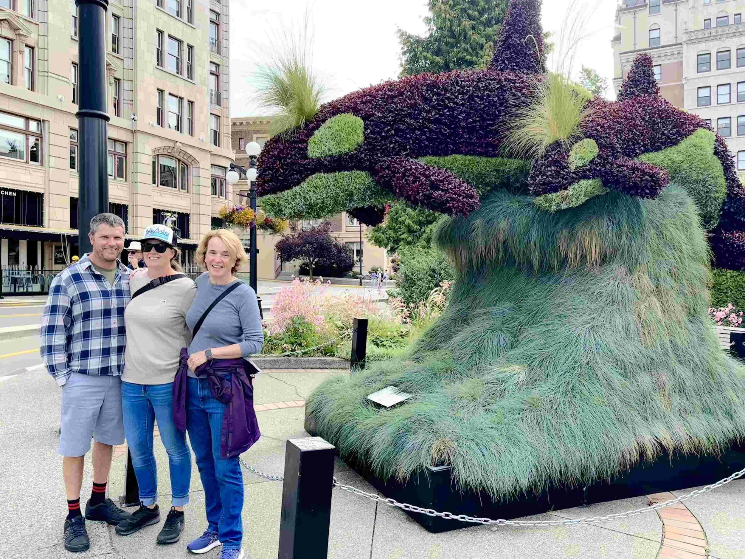 35 - Flowers in the shape of two orcas atop a massive grass wave.