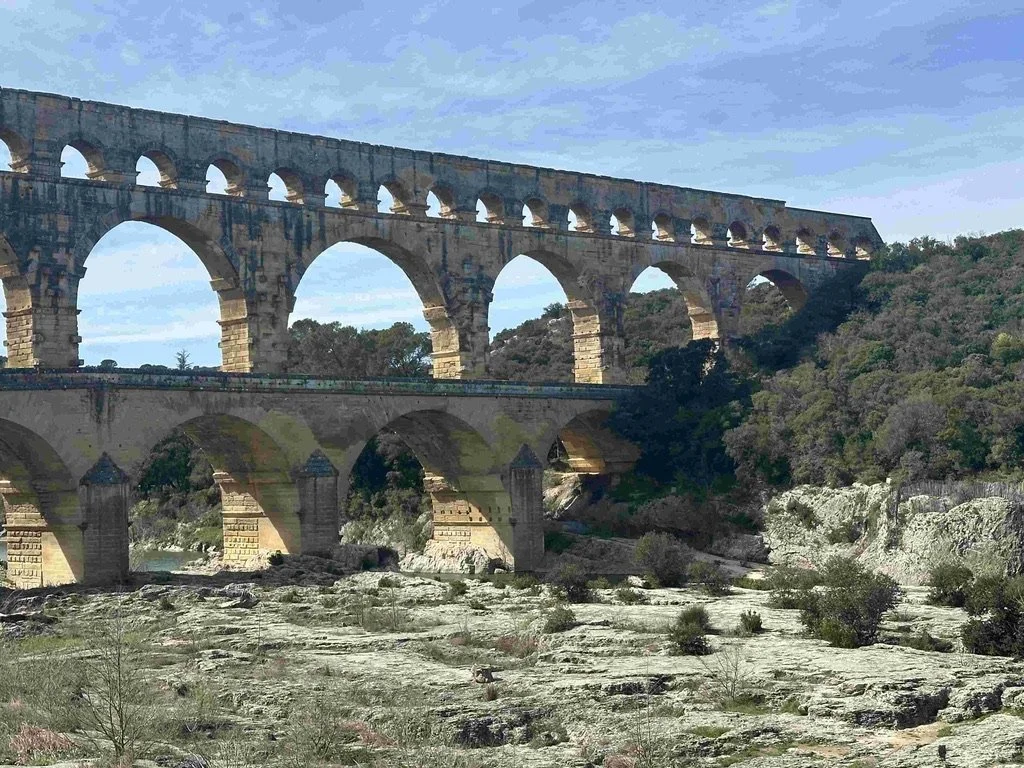 67 - It was challenging to fit the entire aqueduct in a photo.  The Pont du Gard is 902 feet long at its longest point, standing as the highest Roman aqueduct bridge in the world at nearly 165 feet high. 